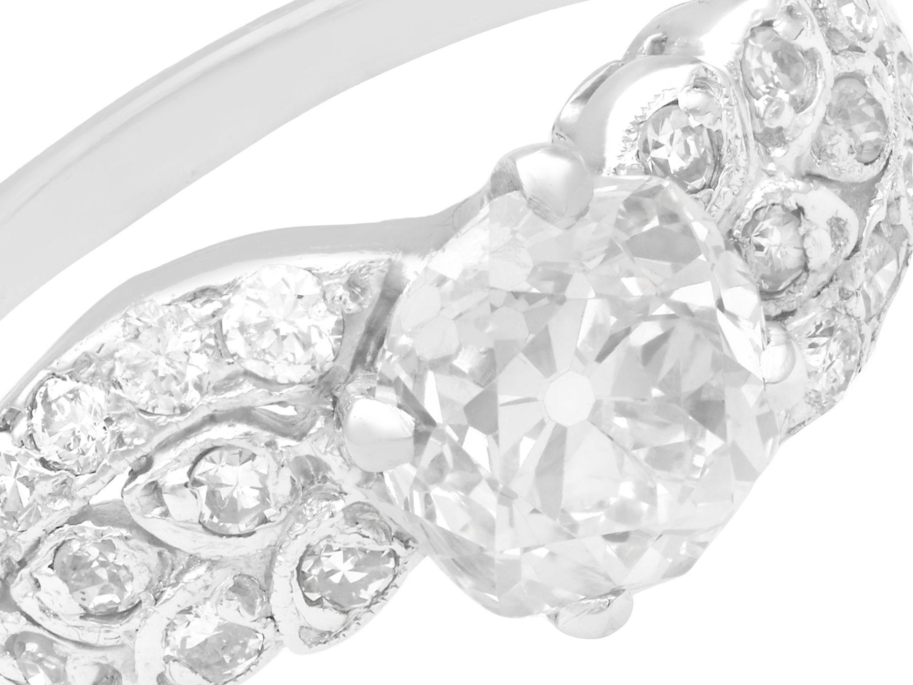 Round Cut 2.70 Carat Diamond White Gold Platinum Set Twist Ring For Sale