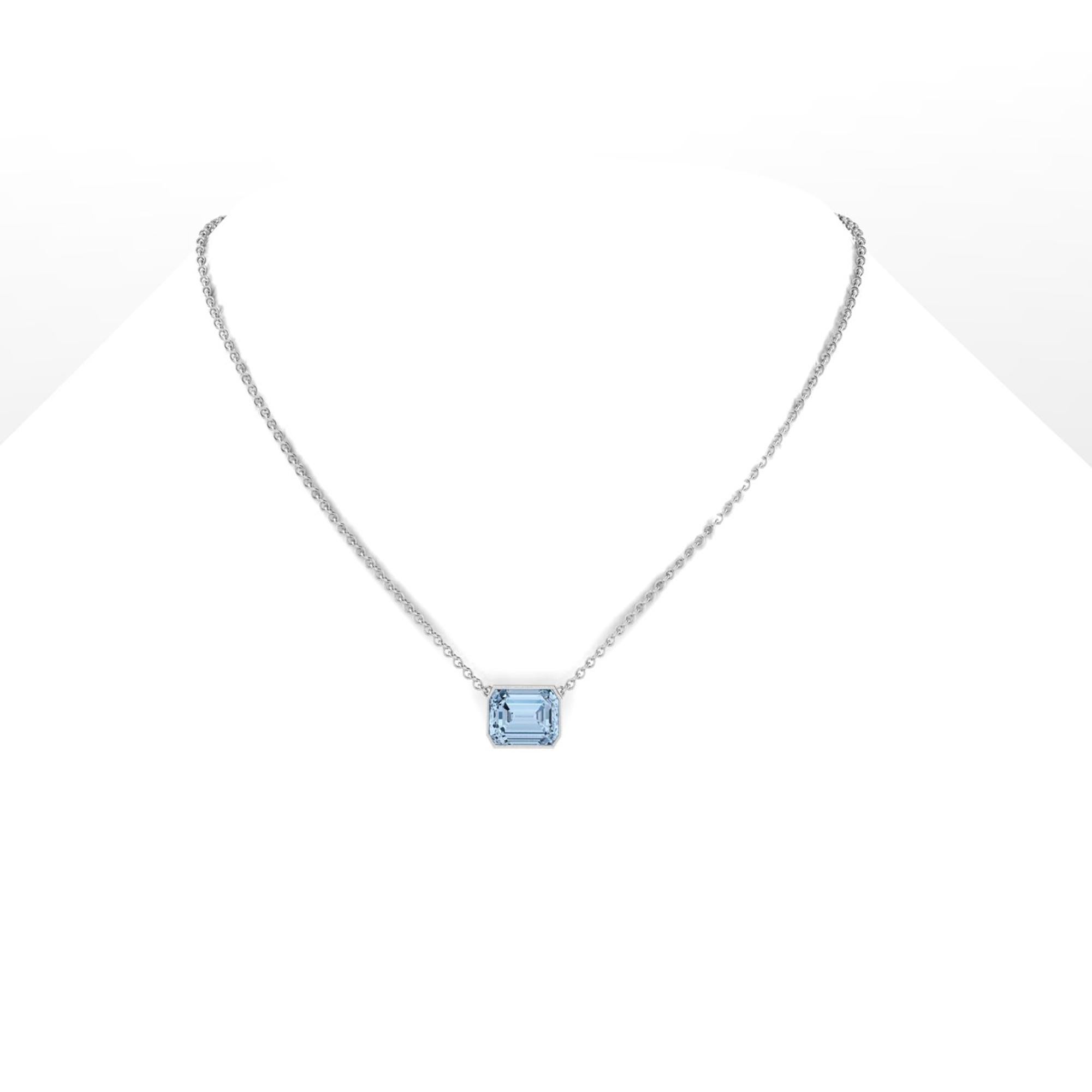An exquisite 4.61 carat Aquamarine, emerald cut, very high quality color, eye clean gem, set in a made to perfection Platinum 950 bezel necklace
The necklace length can be adjusted at 18