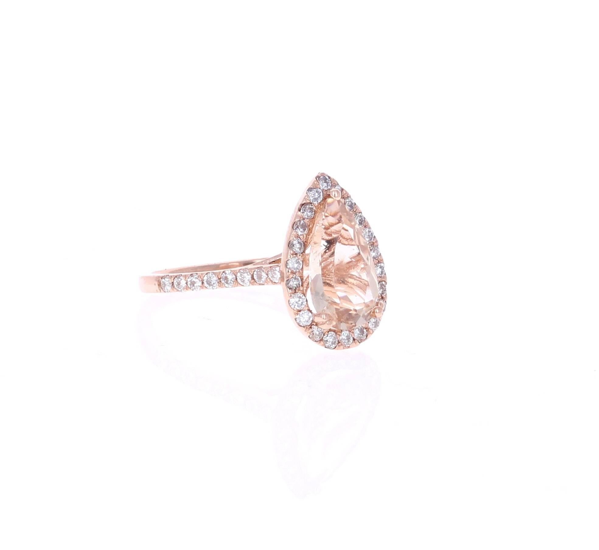 This gorgeous and classy Morganite Ring has a 2.08 Carat Pear Cut Morganite as its center and is surrounded by a Halo of 39 Round Cut Diamonds that weigh 0.62 carats. The clarity and color of the diamonds are SI-F.   The total carat weight of the