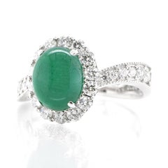 2.70 Carat Natural Emerald Cabochon and Diamond Ring Set in Platinum