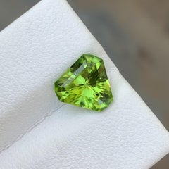 2.70 Carat Natural Loose Green Peridot with Trilliant Shape from Suppat Valley