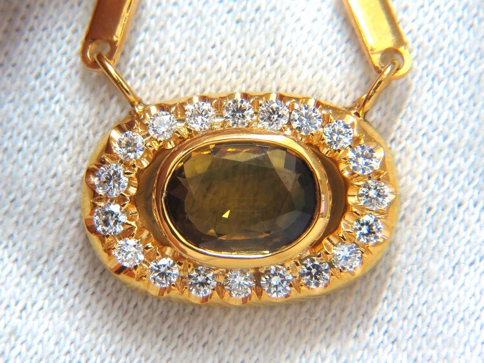 2.00ct. Natural Orange Brown Sapphire Necklace

VS clean clarity

Brilliant Oval cut

6.5 x 9mm

.70ct round diamonds

G-color & Vs-2 clarity.

Overall Pendant Measurement:

.78 X .53 inch.

18kt. yellow gold.

14.25 inches long.

Grand weight: 11.8