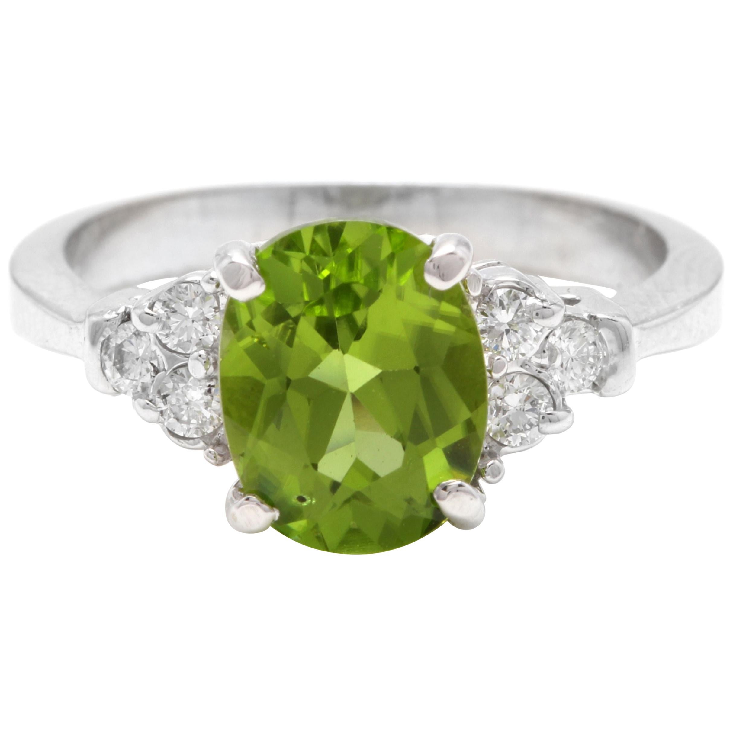 2.70 Carat Natural Very Nice Looking Peridot and Diamond 14K Solid Gold Ring For Sale