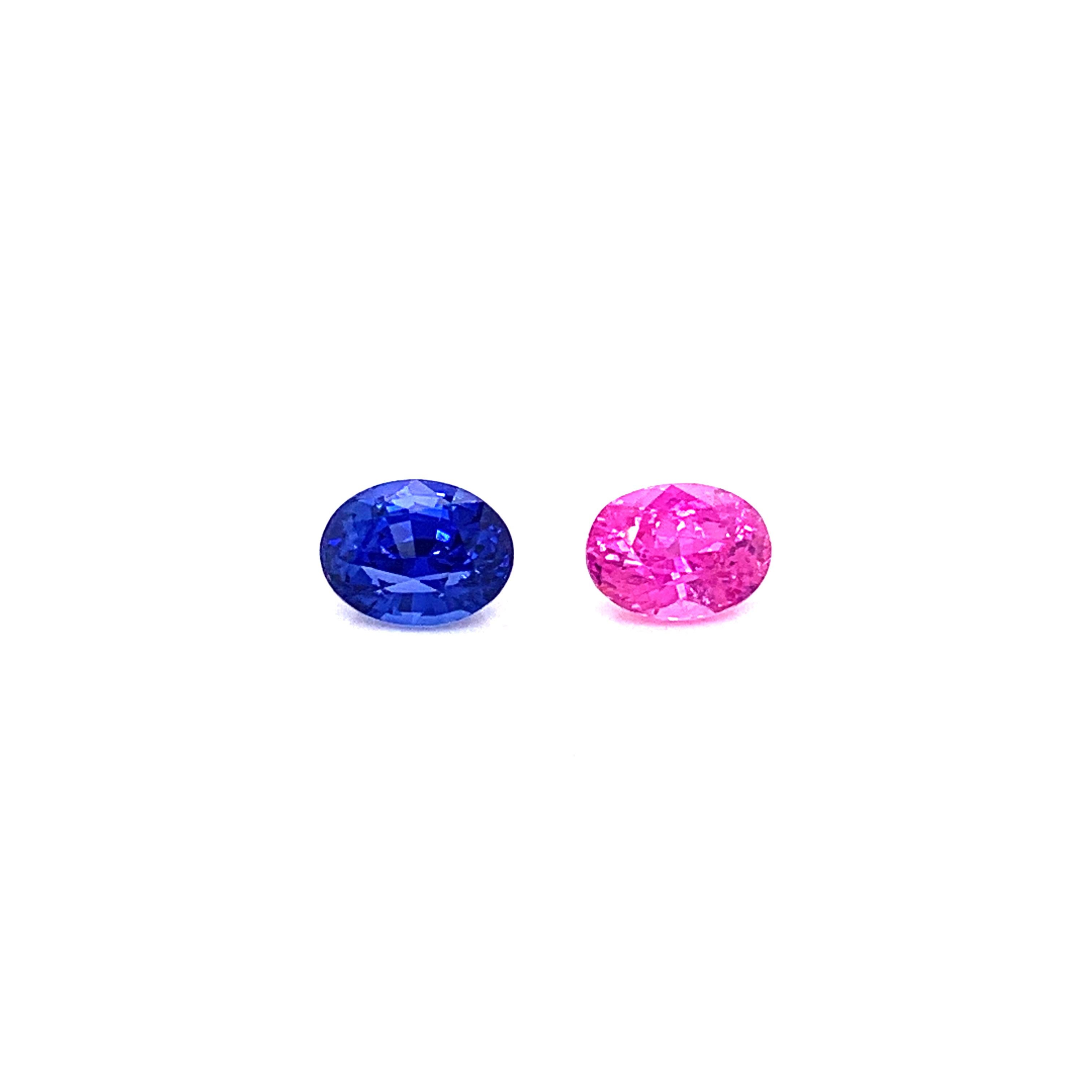 2.70 Carat Oval Shaped Blue and Pink Sapphire Pair:

A very beautiful and elegant pair, it features two natural pink and blue sapphires weighing a total of 2.70 carat. The sapphires have excellent cutting proportions, and possess extremely fine