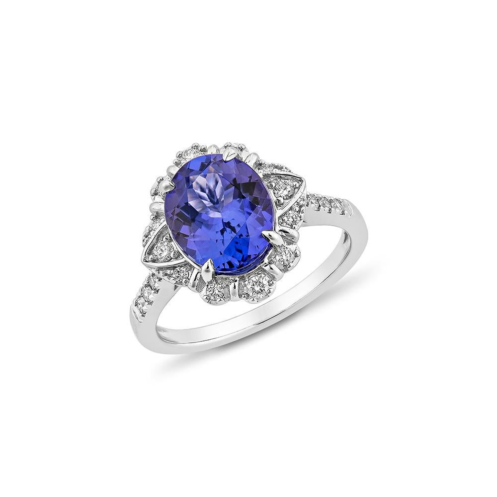 Contemporary 2.70 Carat Tanzanite Fancy Ring in 18Karat White Gold with Diamond. For Sale
