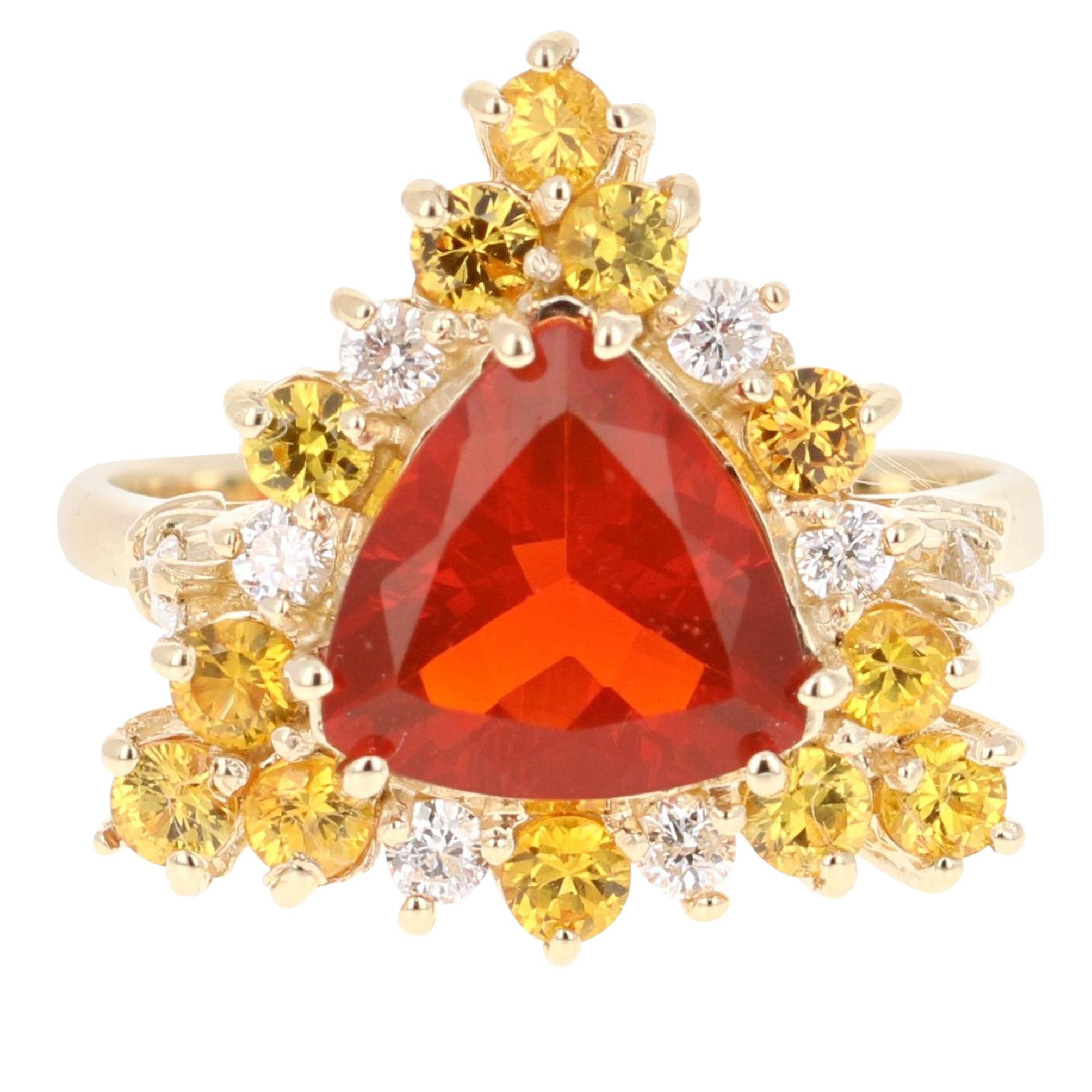 Beautiful Fire Opal, Yellow Sapphire and Diamond Ring!

This uniquely designed ring has a 1.50 carat Trillion Cut Fire Opal in the center of the ring.  The Fire Opal is surrounded by alternating 12 Round Cut Yellow Sapphires that weigh 0.90 carats