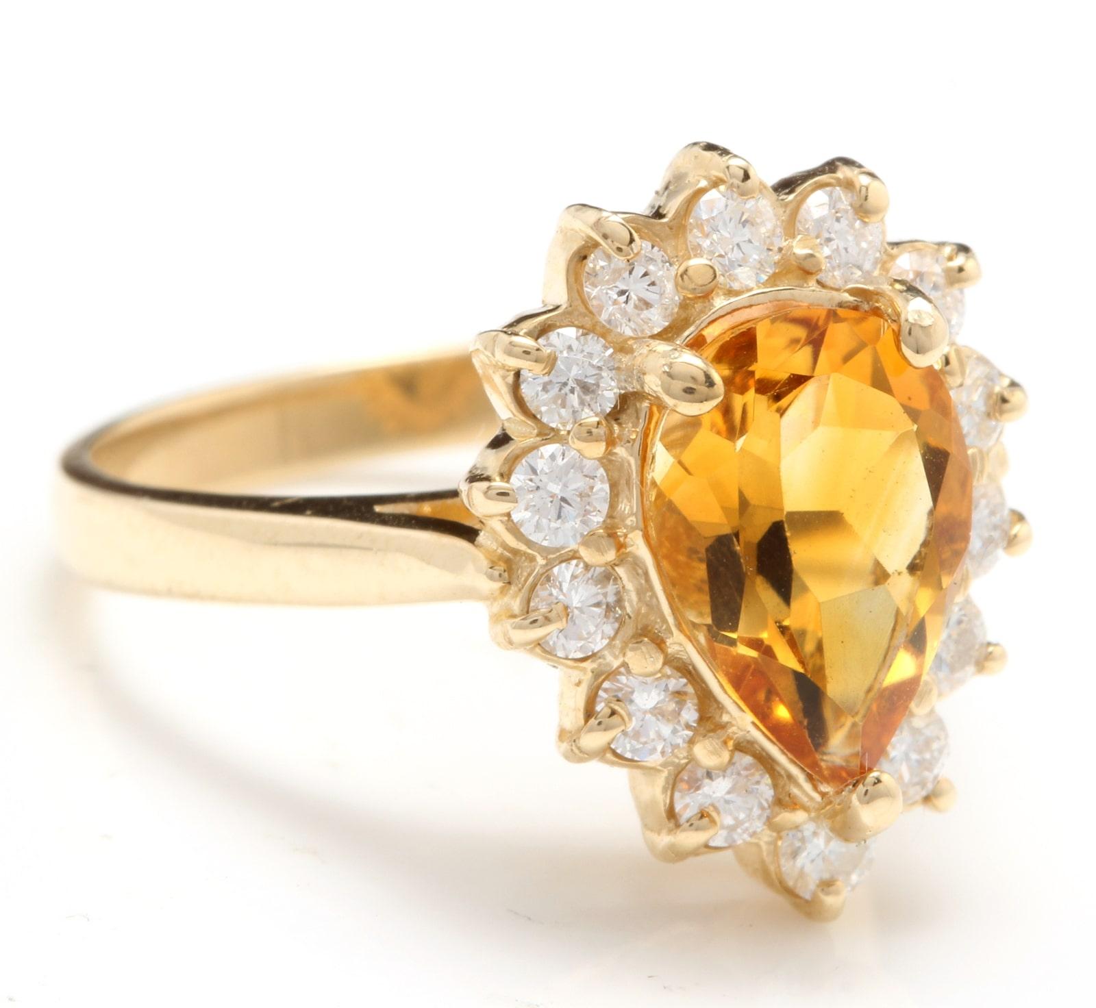 2.70 Carats Natural Very Nice Looking Citrine and Diamond 14K Solid Yellow Gold Ring

Total Natural Pear Shaped Citrine Weight is: Approx. 2.00 Carats

Citrine Measures: Approx. 11 x 7mm

Natural Round Diamonds Weight: Approx. 0.70 Carats (color G-H