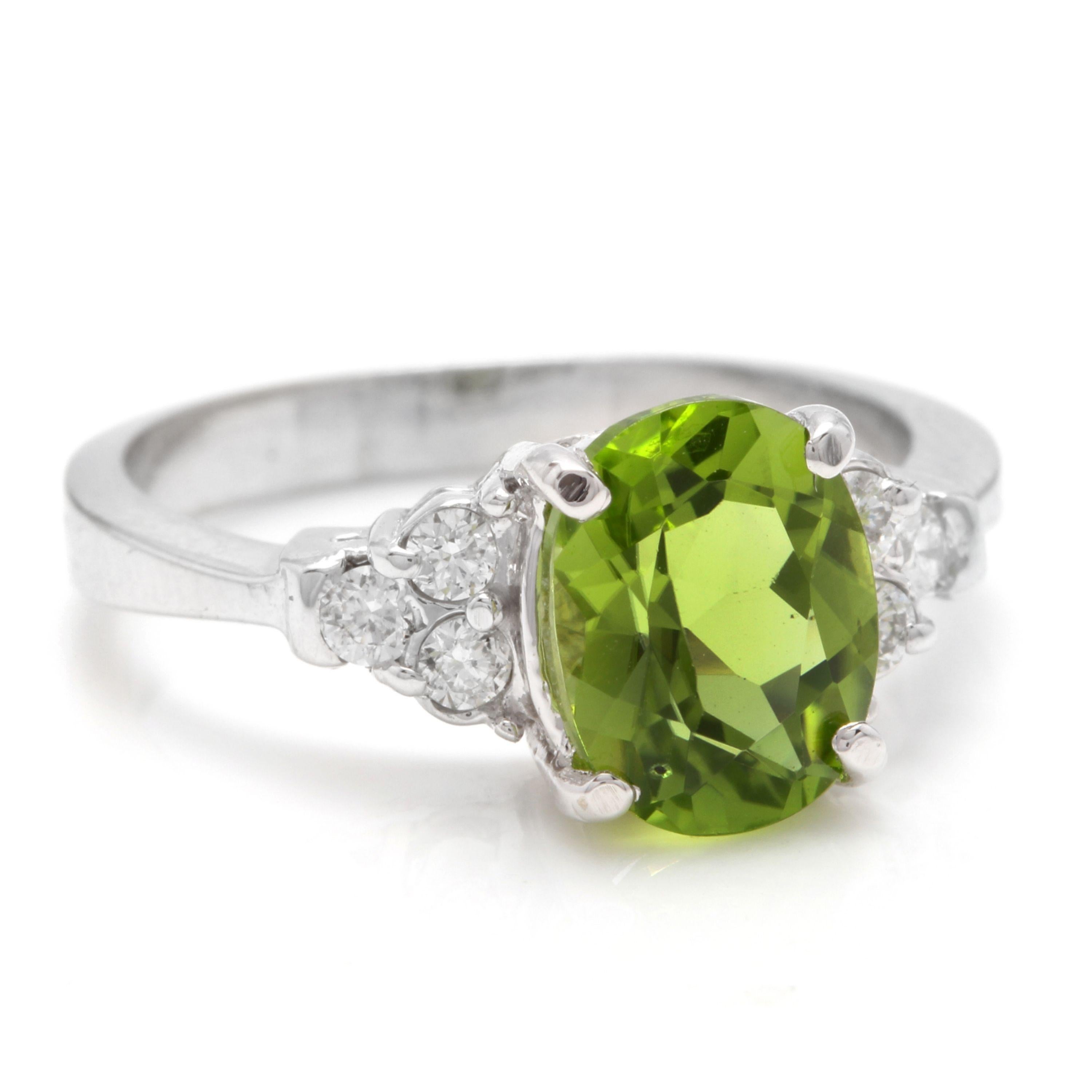 2.70 Carats Natural Very Nice Looking Peridot and Diamond 14K Solid White Gold Ring

Total Natural Oval Peridot Weight is: Approx. 2.50 Carats

Peridot Measures: Approx. 9.00 x 7.00mm

Natural Round Diamonds Weight: Approx. 0.20 Carats (color G-H /