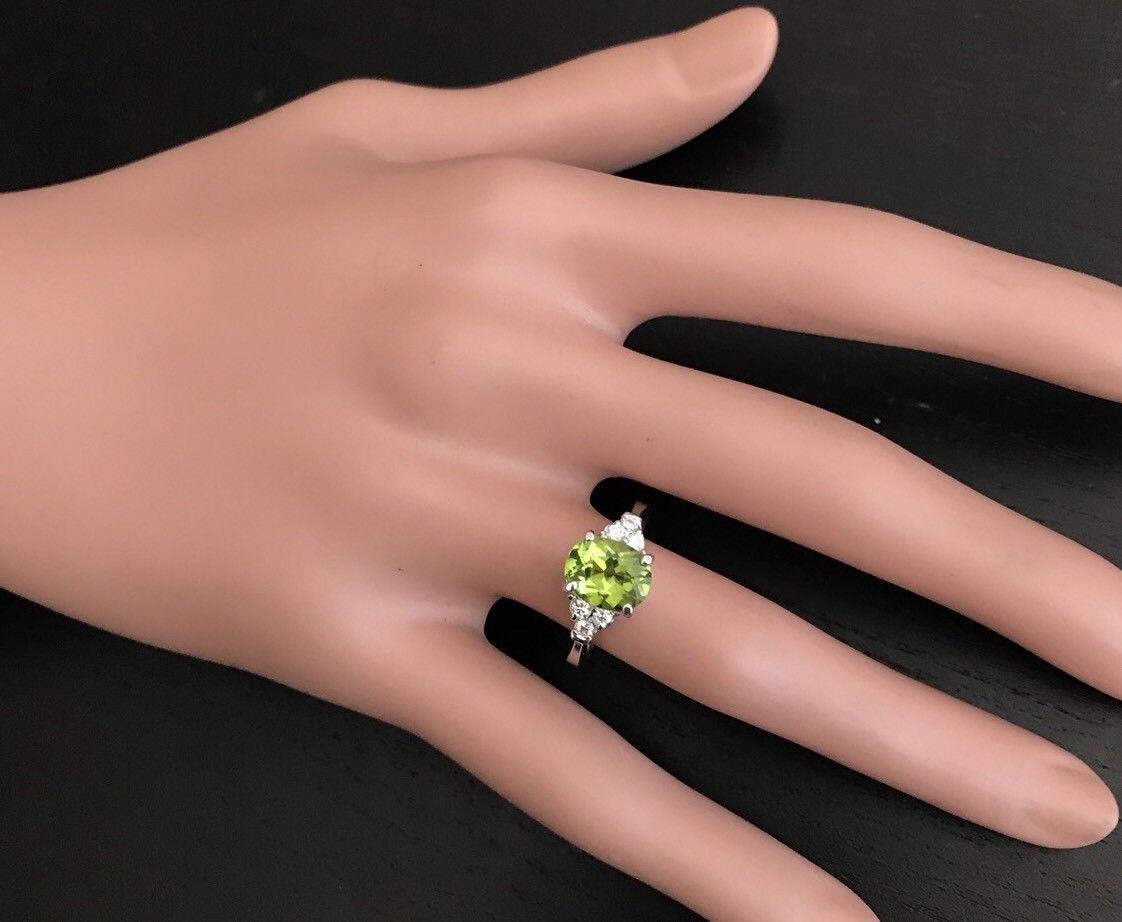 Women's 2.70 Carat Natural Very Nice Looking Peridot and Diamond 14K Solid Gold Ring For Sale