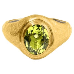 2.70 ct Oval Bright Green Peridot Signet Ring with 24kt Gold and Silver