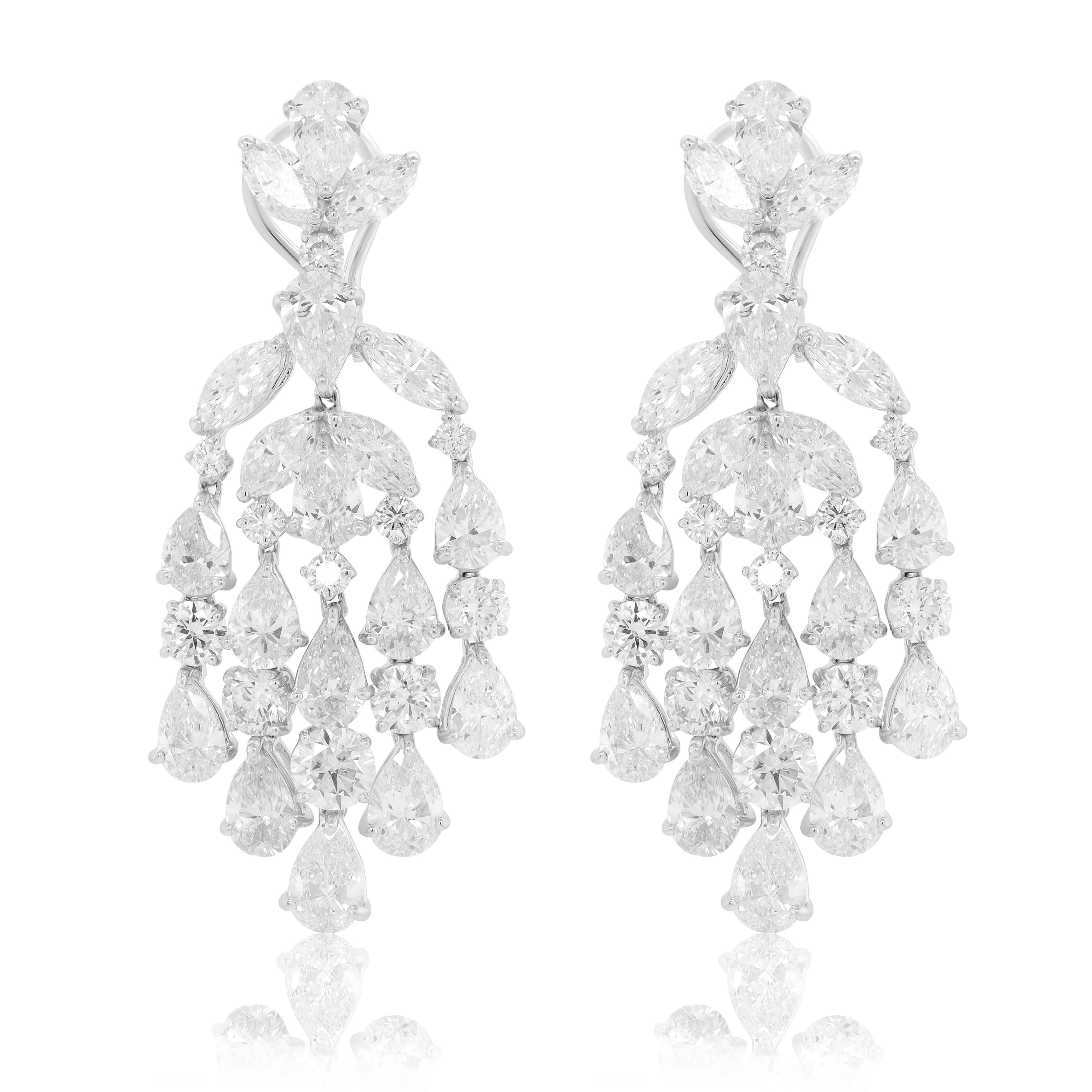 Platinum Chandelier Diamond Earrings, with top diamond cluster and five drops. Features 27.00 Carats of Diamonds. G-H in Color VS in Clarity. 
