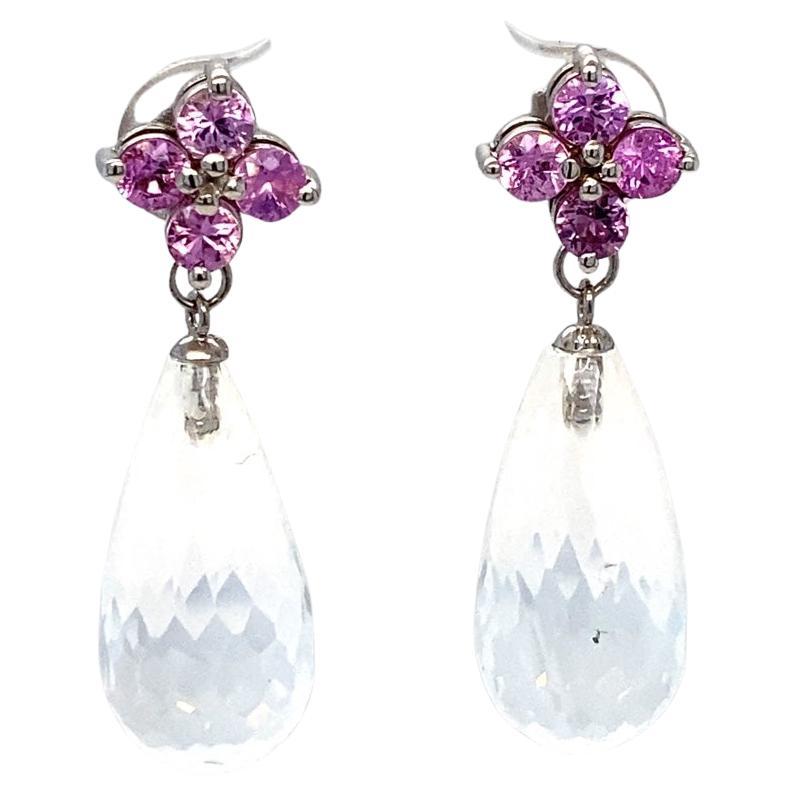 27.07 Carat Moon Quartz Sapphire White Gold Drop Earrings

Item Specs:

2 Faceted Briolette Moon Quartz stones weighing approximately 25.72 carats
(Measurements of Moon Quartz Faceted Briolette 20mm x 10mm) 
8 Round Cut Pink Sapphires weighing