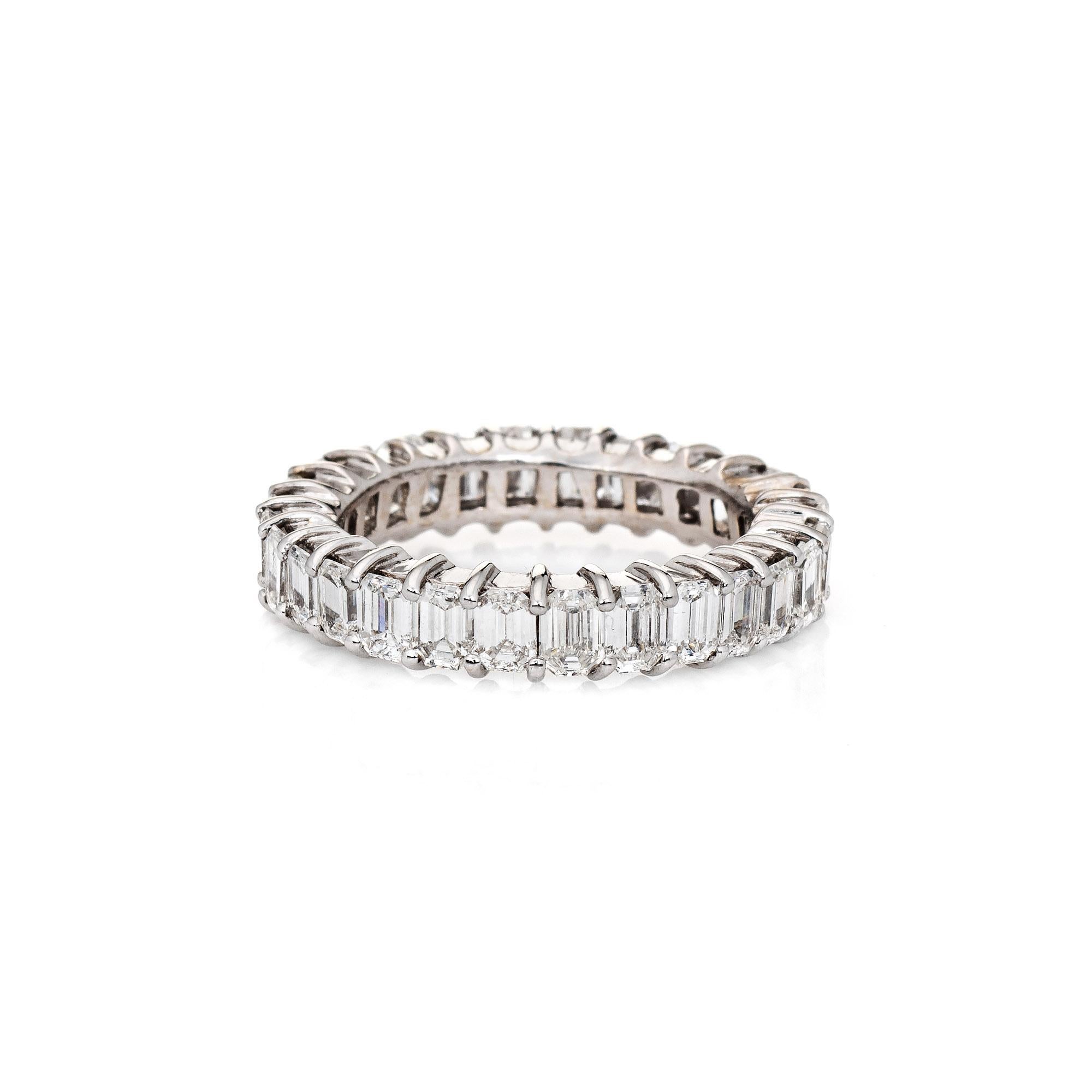 Elegant vintage diamond eternity ring (circa 1980s to 1990s), crafted in 18k white gold. 

27 single emerald cut diamonds are estimated at 0.10 carats each and total an estimated 2.70 carats (estimated at G-H color and VS2-SI1 clarity).

The ring