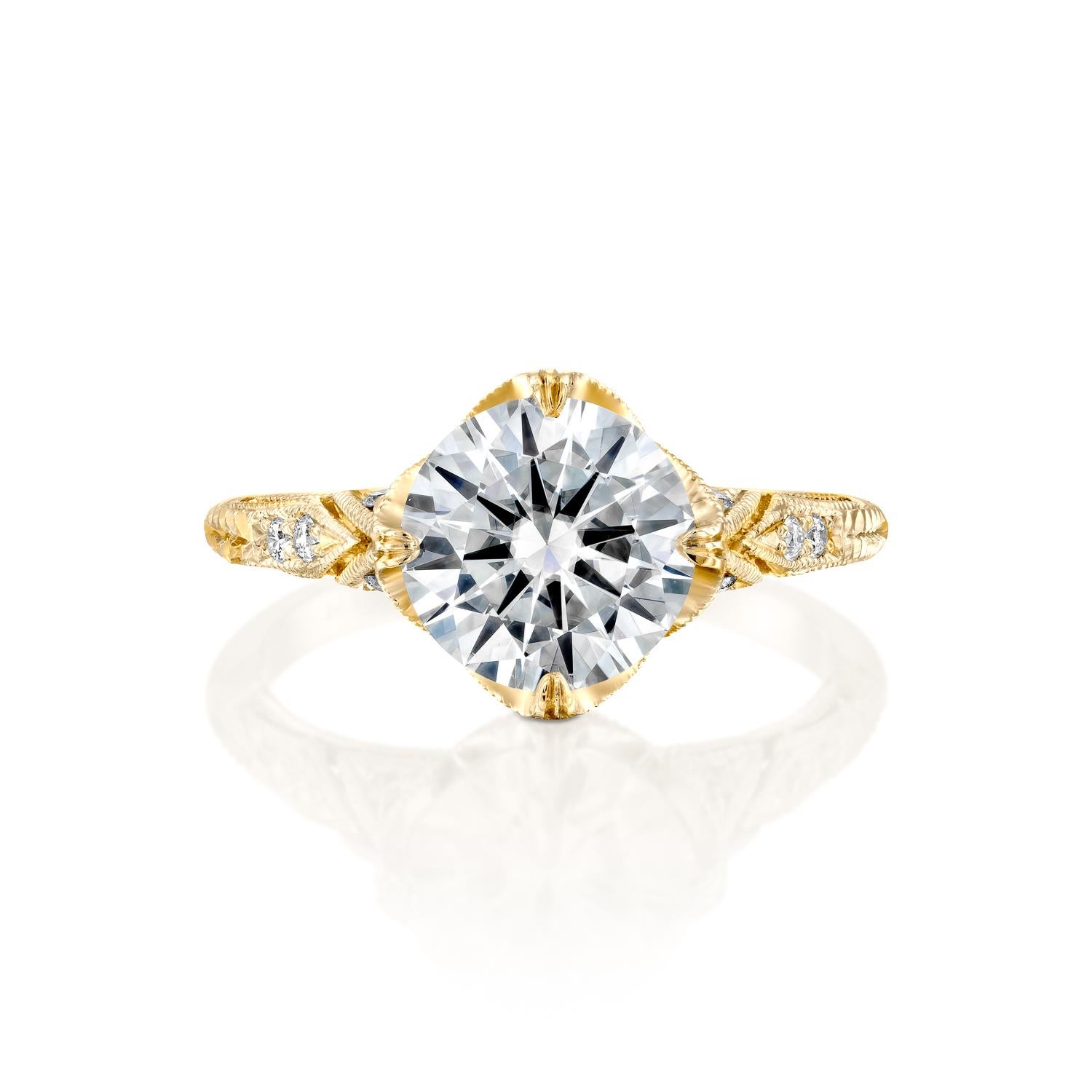 This gorgeous ring features a solitaire GIA certified diamond. Center stone is natural 2.5 carat, round shaped 100% eye clean natural diamond of F-G color and VS2-SI1 clarity and it is surrounded by smaller natural round diamonds of 0.2 total carat