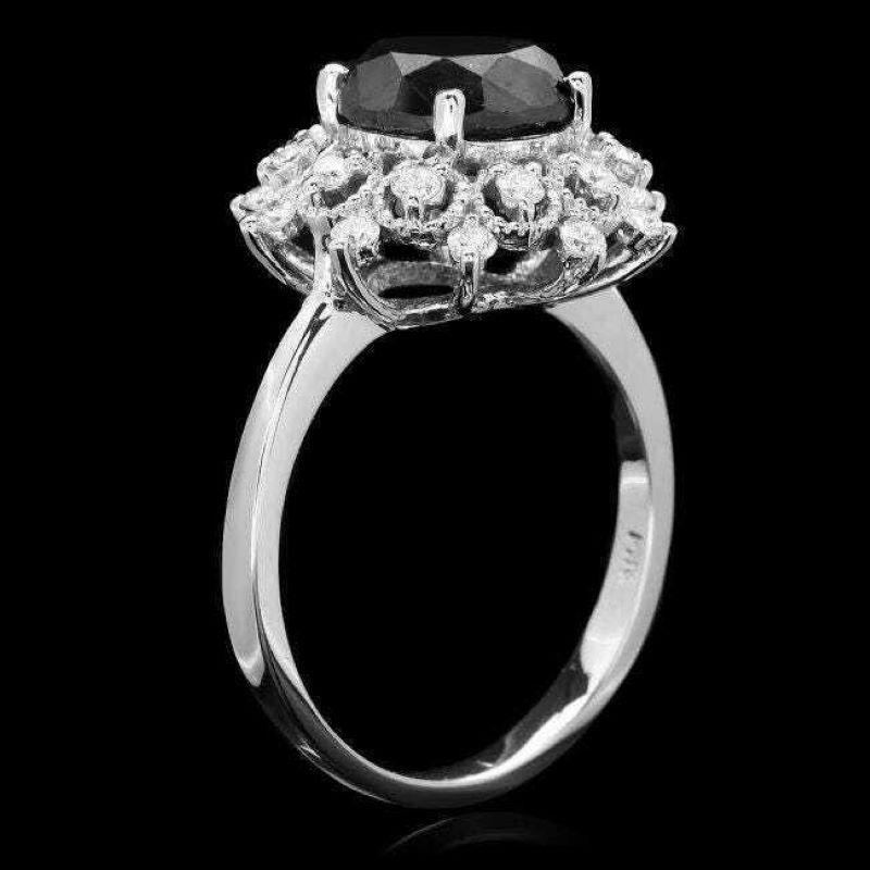 Splendid 2.70 Carats Natural Black & White Diamond 14K Solid White Gold Ring

Suggested Replacement Value: $5,000.00

Stamped: (14K)

Natural Black Round Center Diamond Weight is Approx. 2.20 Carats (Color Treated)

Center Diamond Measures Approx.