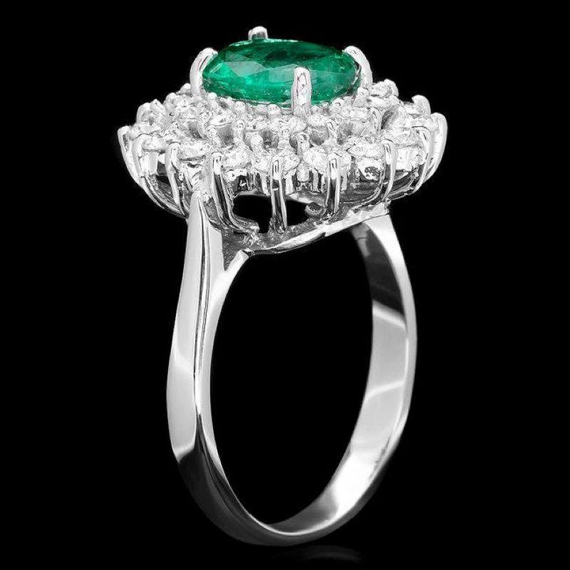 2.70 Carats Natural Emerald and Diamond 14K Solid White Gold Ring

Total Natural Green Emerald Weight is: Approx. 1.40 Carats

Emerald Measures: 9 x 7 mm

Natural Round Diamonds Weight: 1.30 Carats (color G-H / Clarity SI1-SI2)

Ring size: 7 (free