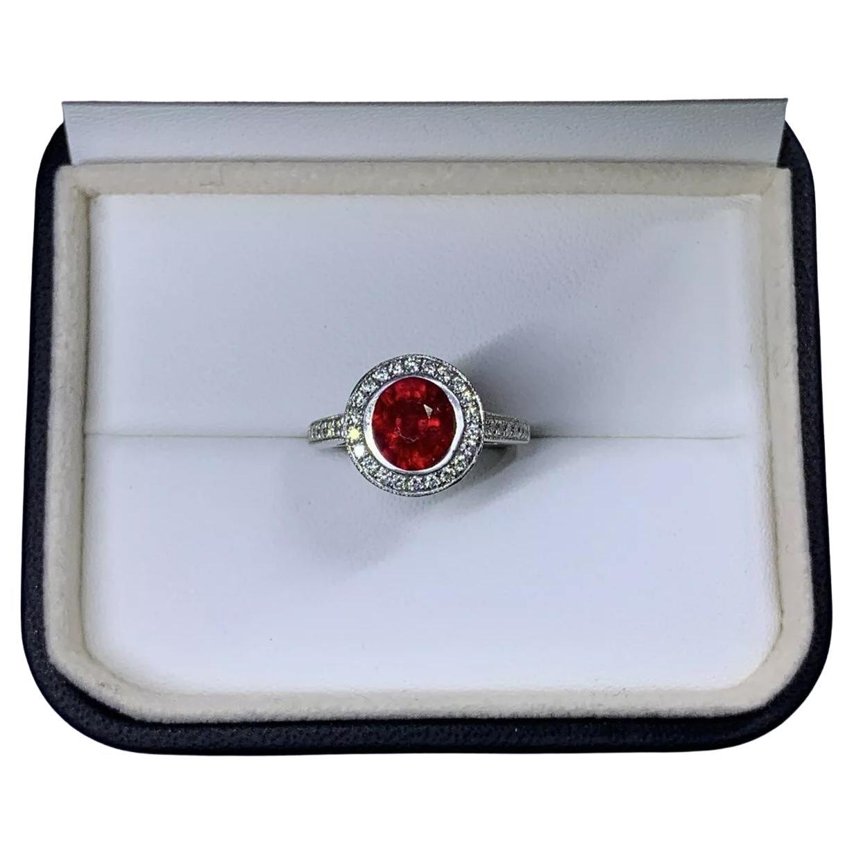 2.70ct Ruby burma and diamond engagement ring in 18k white gold.