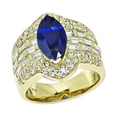 Anello in oro con zaffiro da 2,70 carati, diamante da 1,66 carati e diamante Pink Diamond di colore fantasia