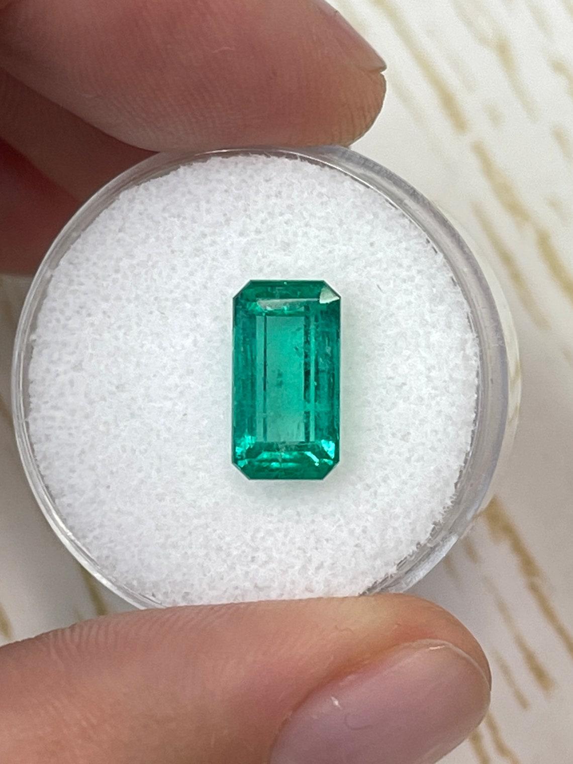 Modern 2.70ct Yellowish Elongated Emerald Cut Colombian Gem: 11.4x6 Genuine May For Sale