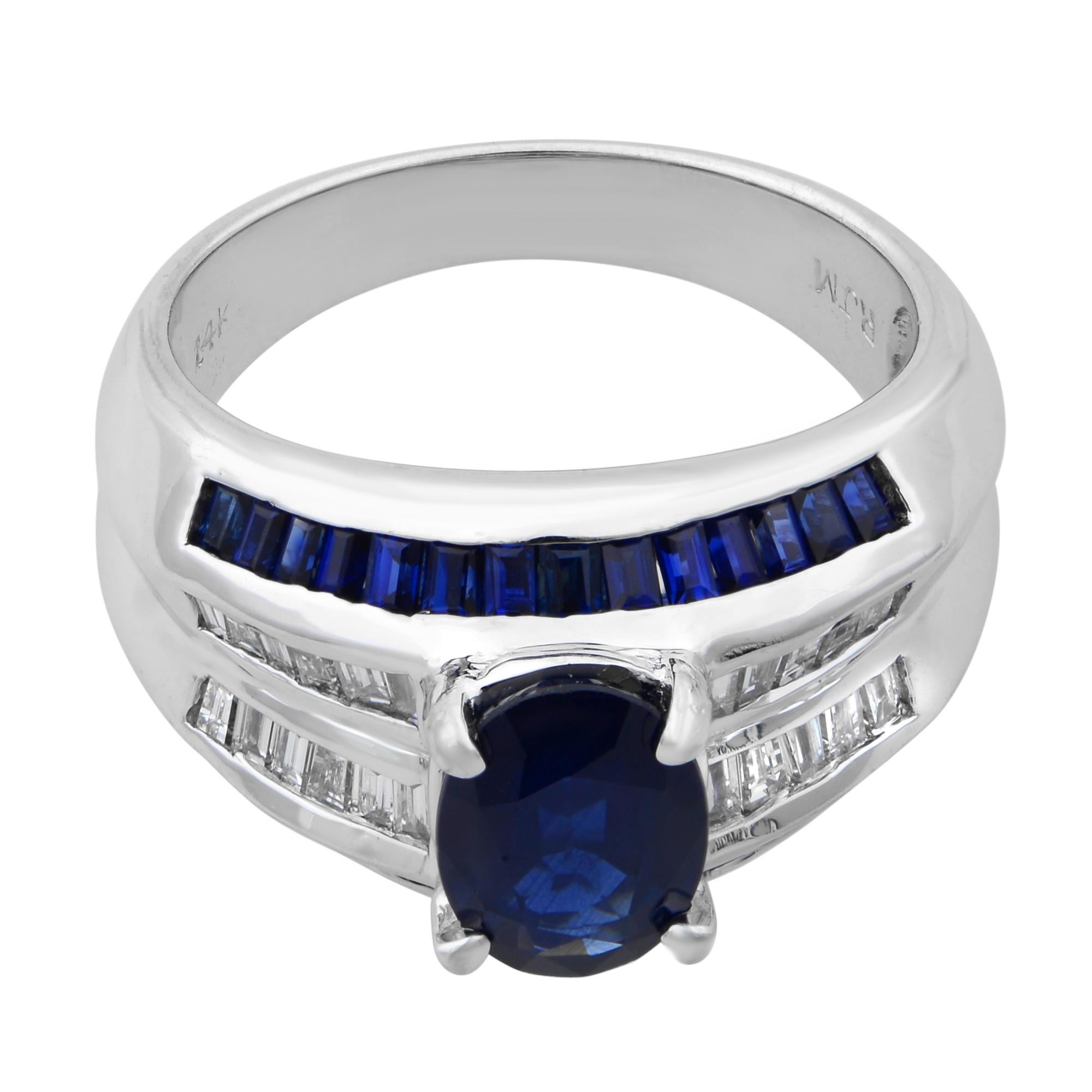 Magnificent blue Sapphire diamond cocktail ring. Showcasing high brilliance, this ring is centered by a beautiful prong set oval cut blue Sapphire weighing 2.70 carats and accentuated by 0.45 carat of sparkling baguette cut diamonds. Mounted in fine