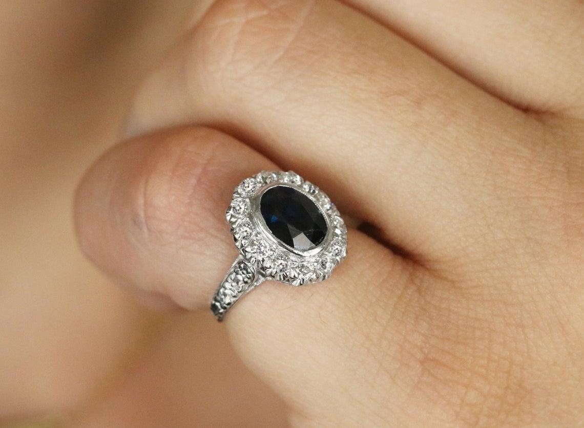 Oval Cut 2.70tcw Vintage Natural Sapphire & Diamond Halo Platinum Ring For Sale
