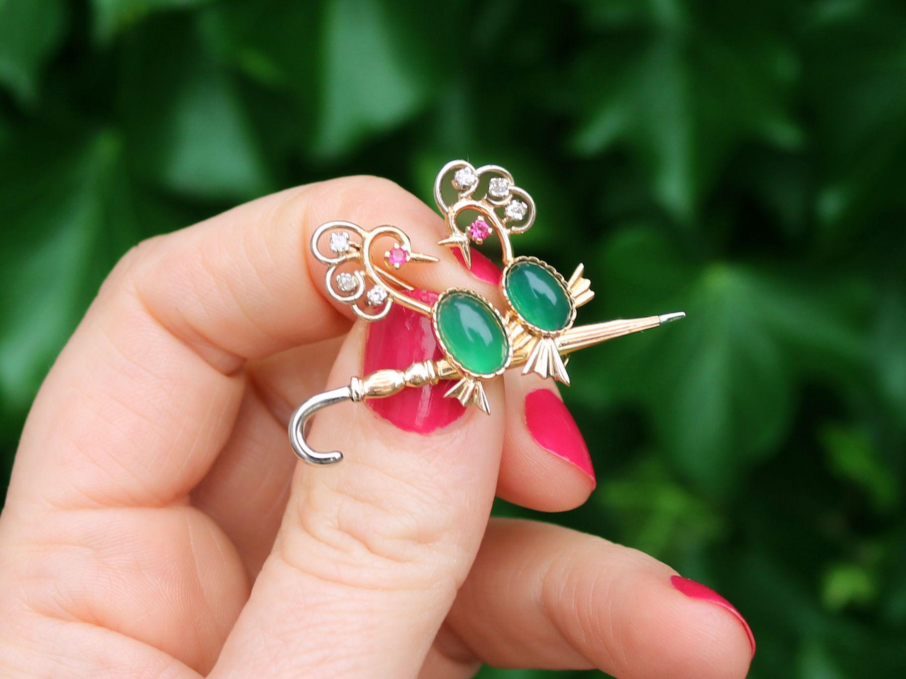 A fine and impressive vintage French 2.71 carat chrysoprase, 0.16 carat diamond and 0.07 carat ruby, 18 karat yellow gold bird brooch; part of our diverse gemstone jewellery collections.

This fine and impressive gemstone brooch has been crafted in