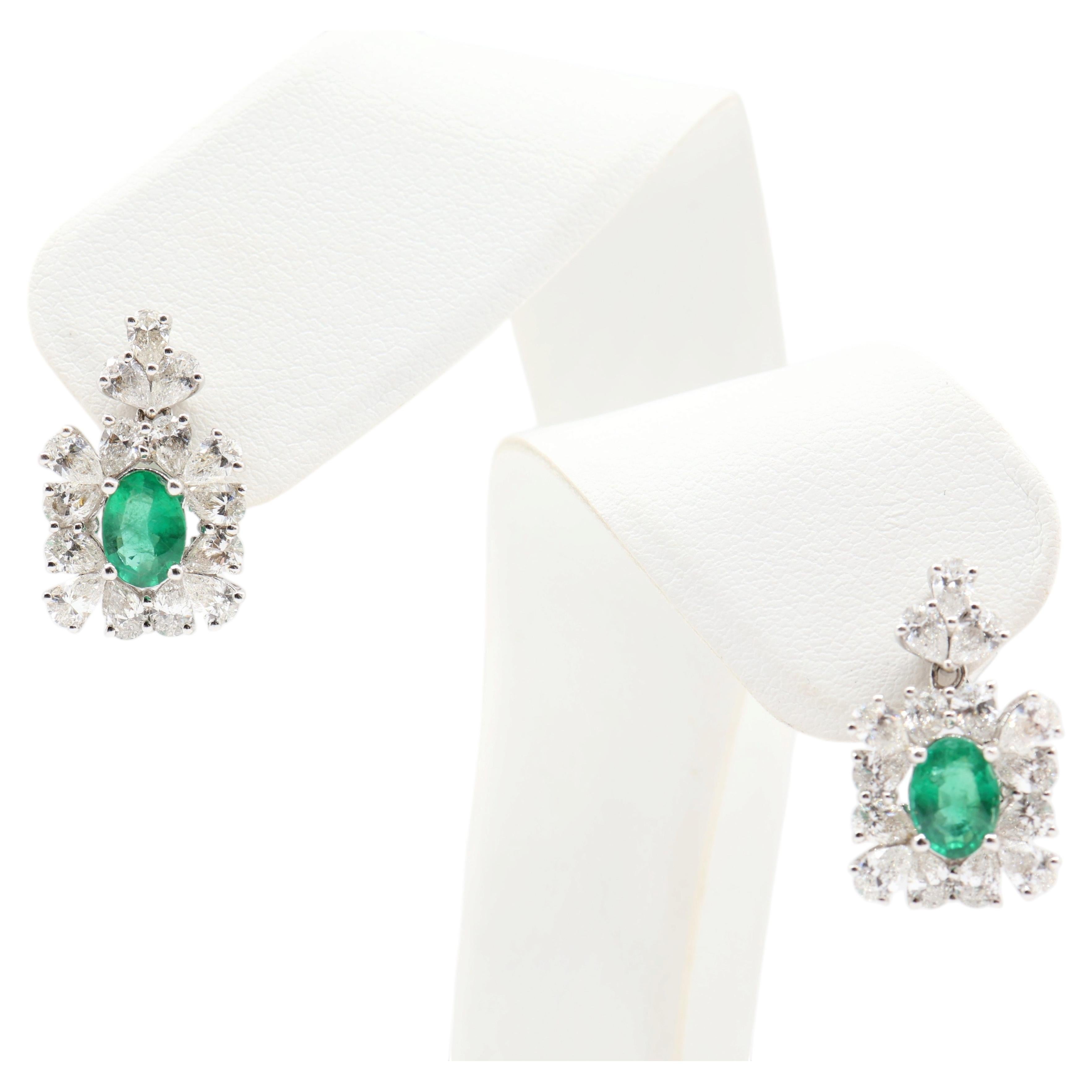 2.71 Carat Diamond and Oval-Cut Emerald Halo Drop Earrings in 18K White Gold For Sale