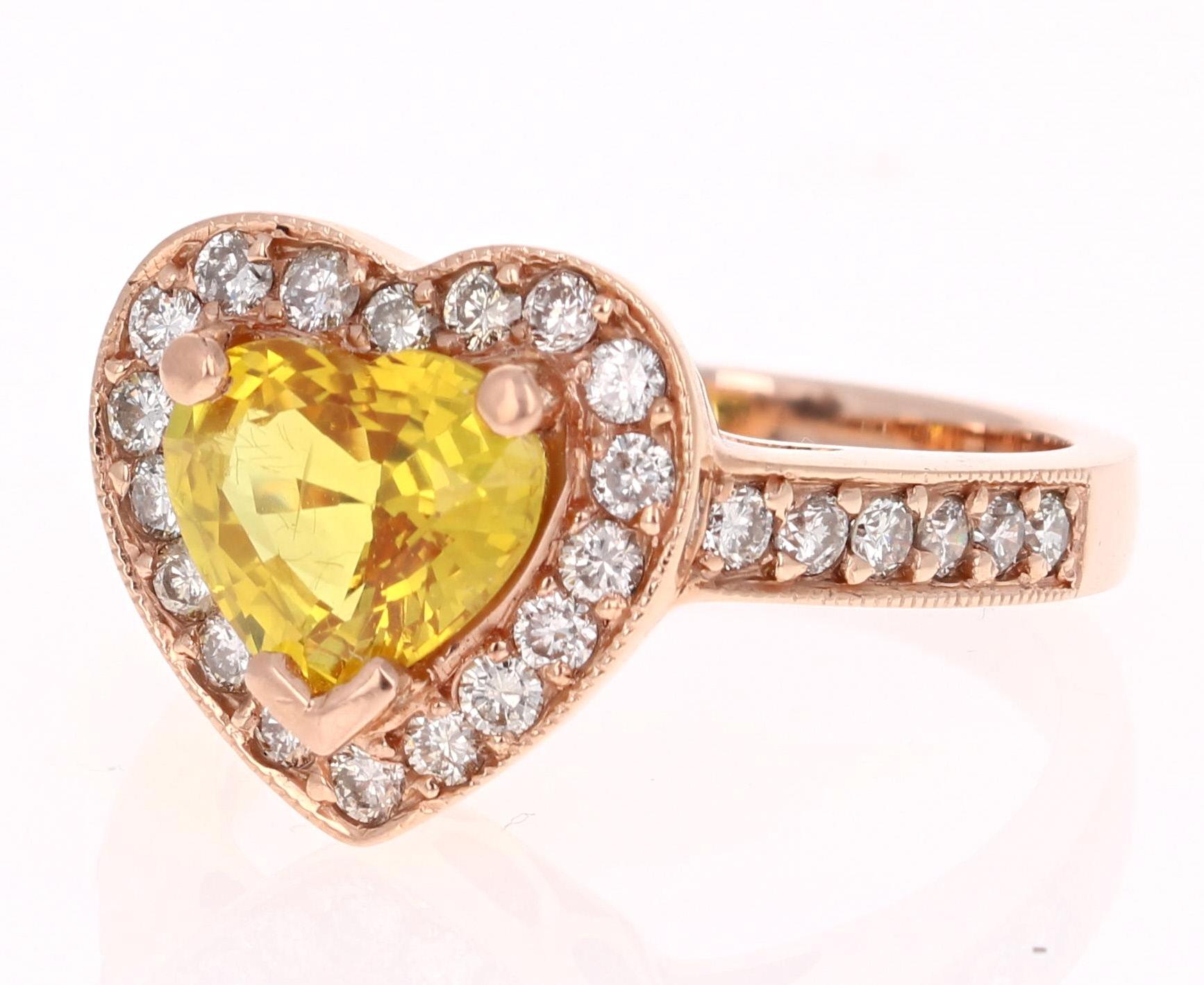 Beautiful Heart Cut Sapphire and Diamond Ring that can be that special someone's Engagement Ring.

This ring has a 2.02 carat Heart Cut Yellow Sapphire in the center of the ring and is surrounded by a halo 30 Round Cut Diamonds that weigh 0.69