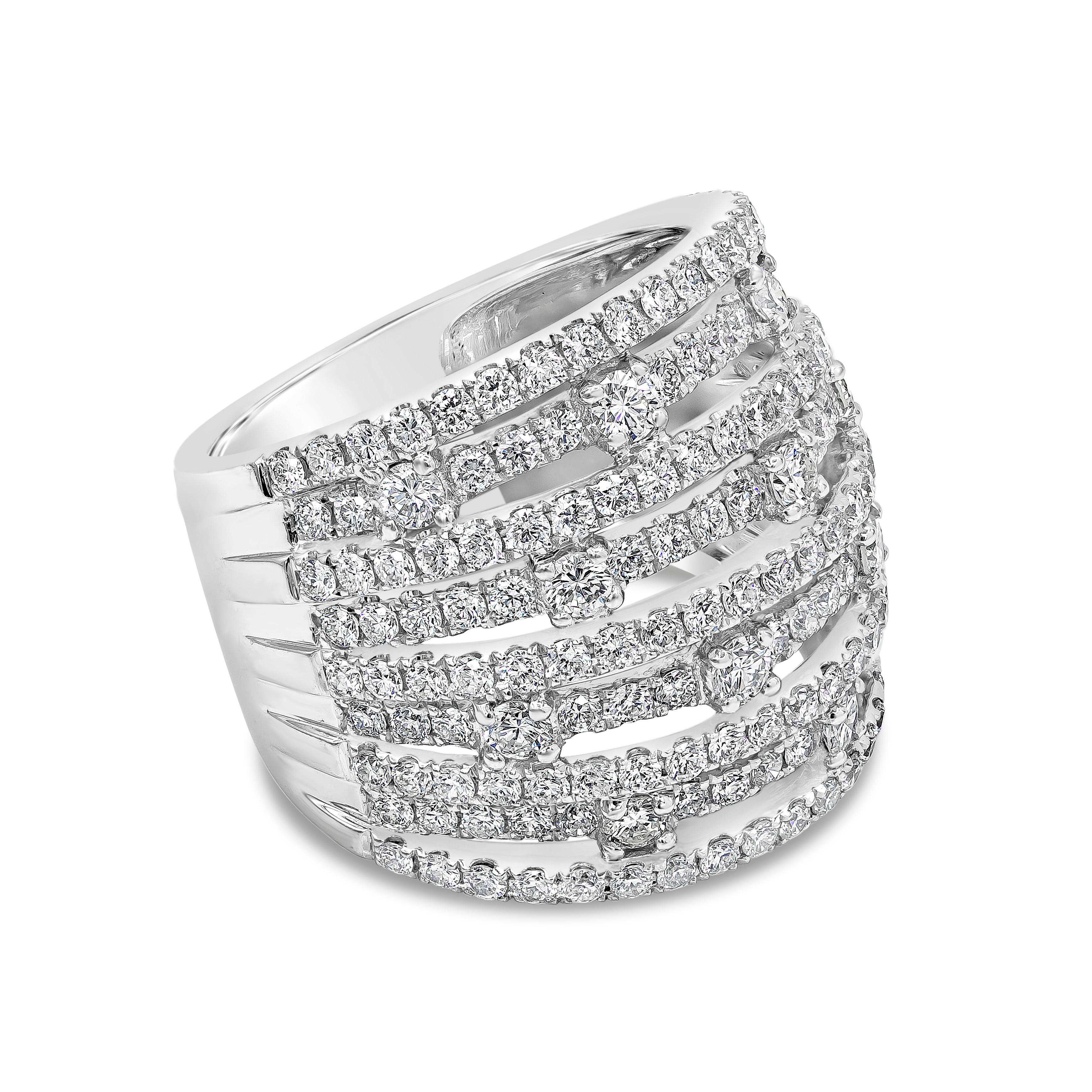 A brilliant and fashionable band ring showcasing nine rows of round brilliant diamonds weighing 2.71 carats total. Set in a open work setting. Made in 18K White Gold, Size 7 US and resizable upon request.

Roman Malakov is a custom house,