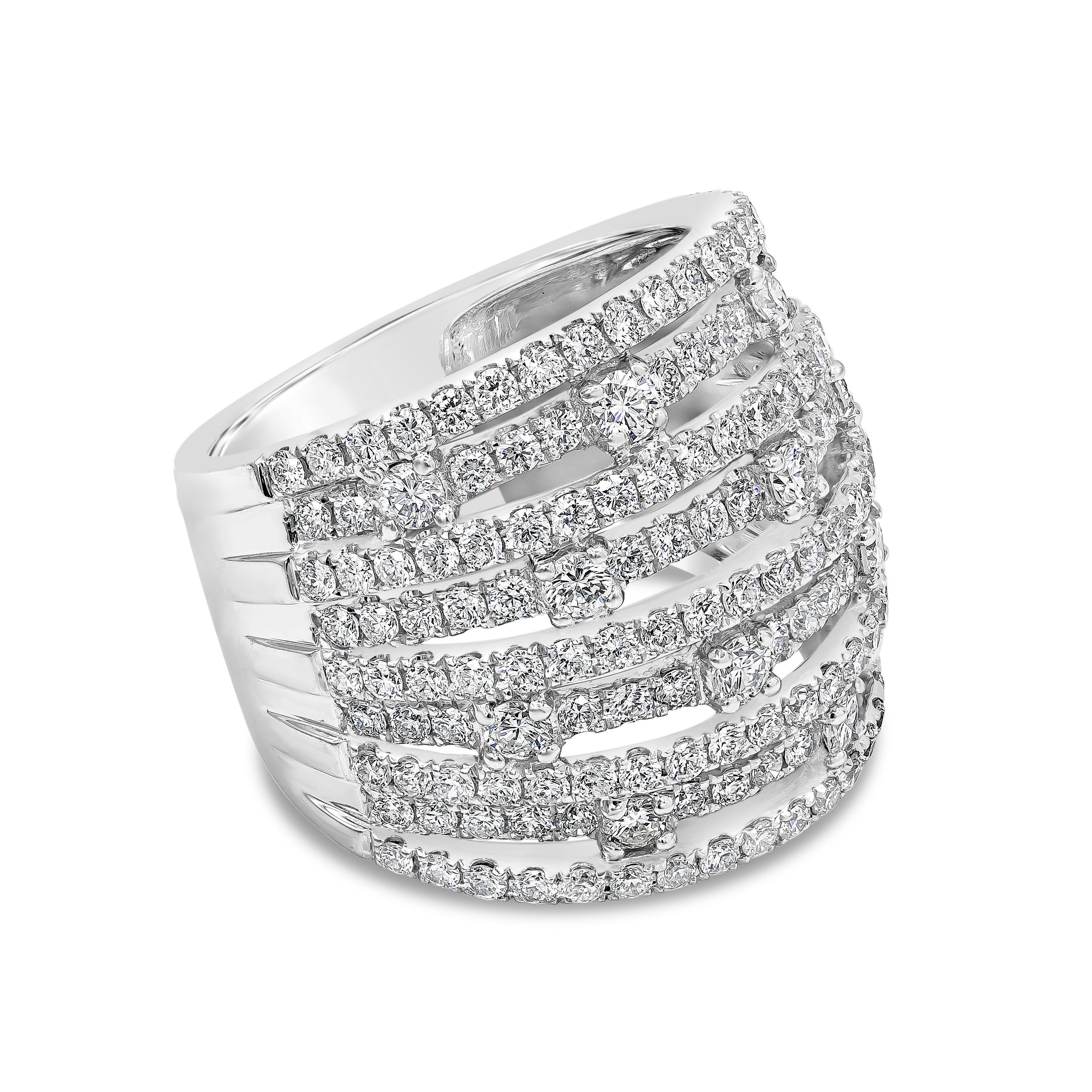 A fashionable wide band ring, showcasing nine rows of round brilliant cut diamonds weighing 2.71 carats total, set on an open-work pavé setting. Finely made with 18K white gold. Size 7 US, resizable upon request. 

Roman Malakov is a custom house,
