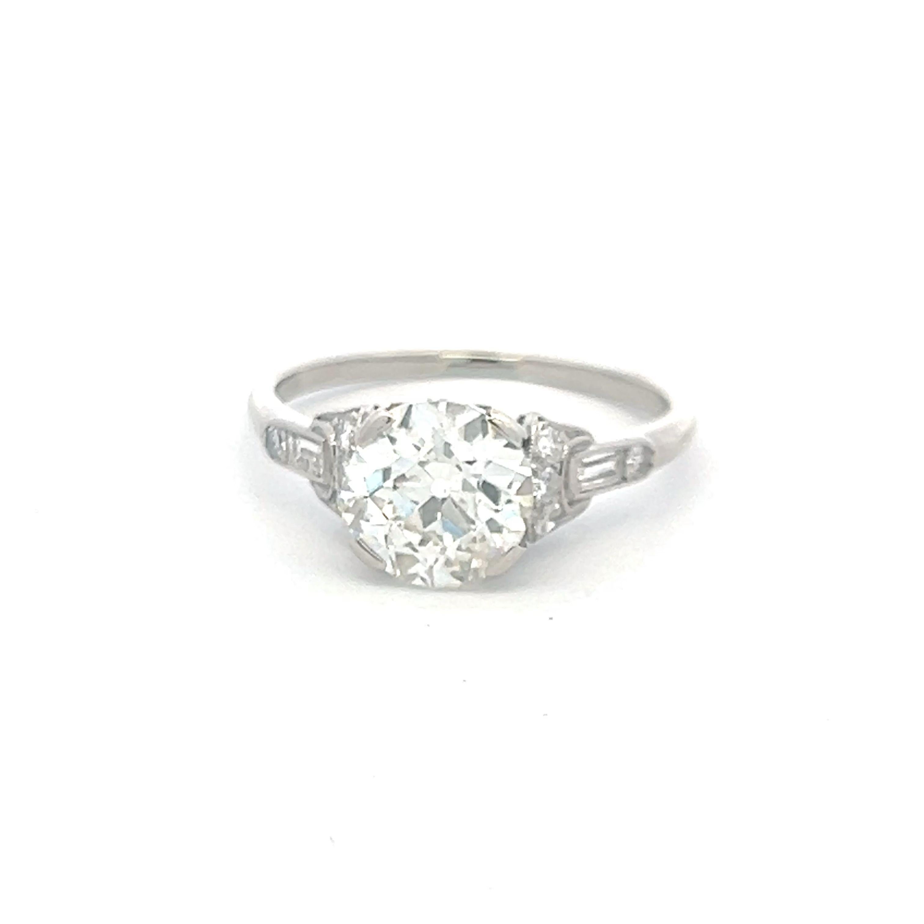 2.71 Carat Old European Cut and Emerald Cut Diamond Platinum Art Deco Ring For Sale 1