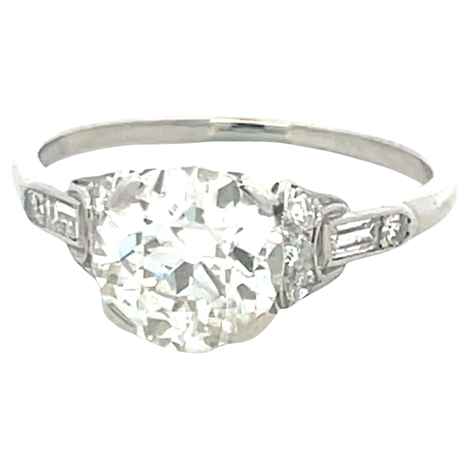 2.71 Carat Old European Cut and Emerald Cut Diamond Platinum Art Deco Ring For Sale