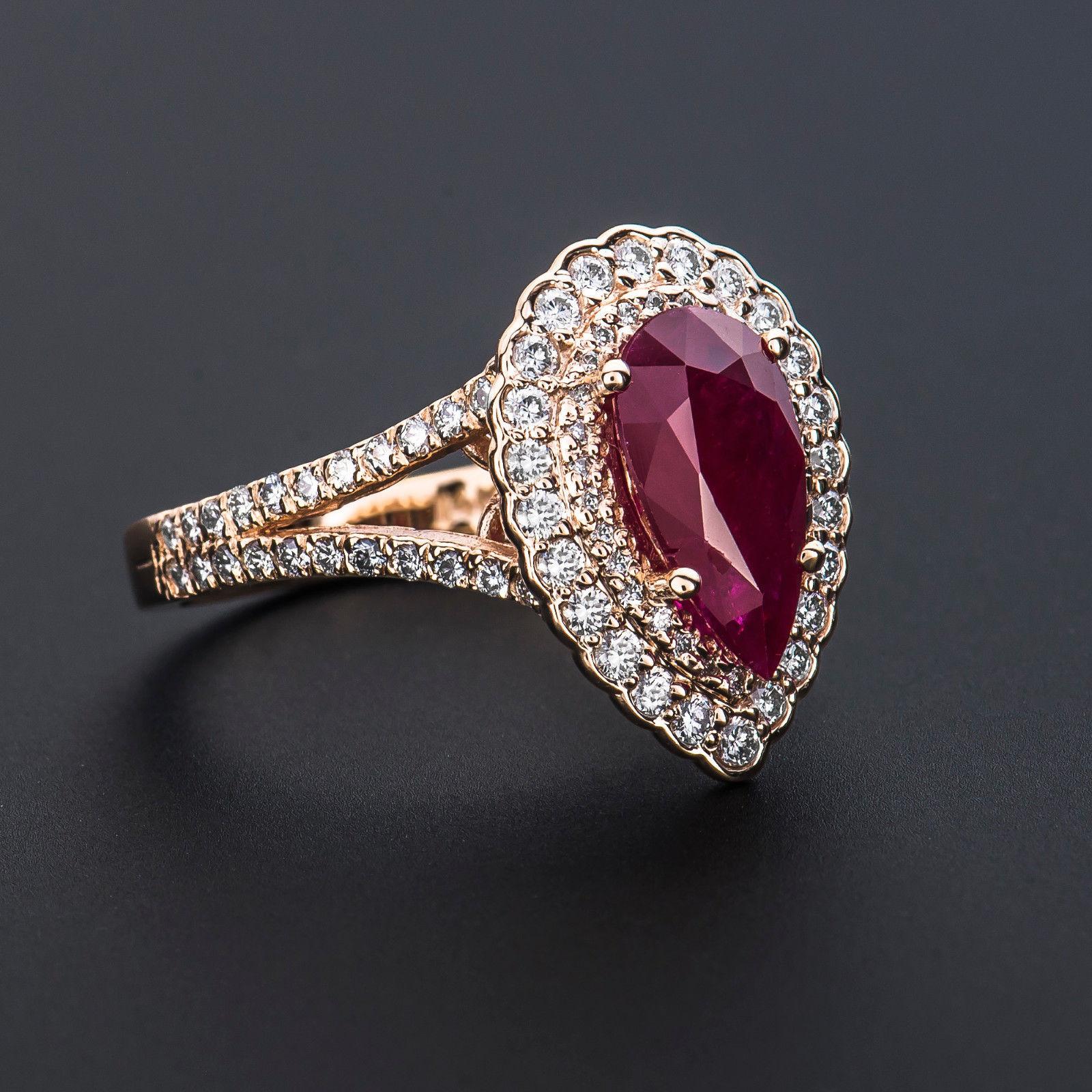 2.71 Carat Pear Shape Ruby with 0.96 Carat Round Brilliant Diamonds in Halo Ring Damen
