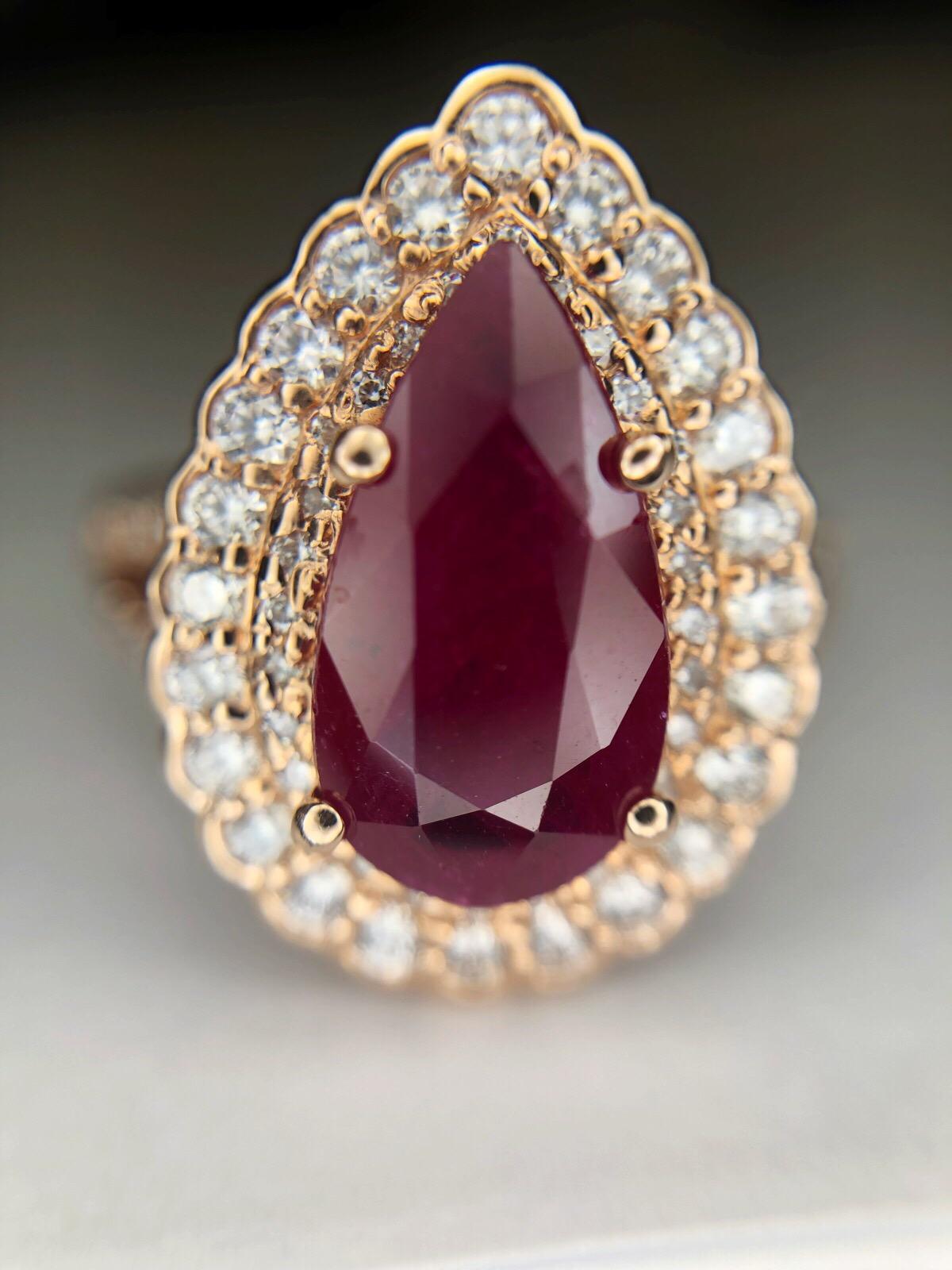 2.71 Carat Pear Shape Ruby with 0.96 Carat Round Brilliant Diamonds in Halo Ring 1