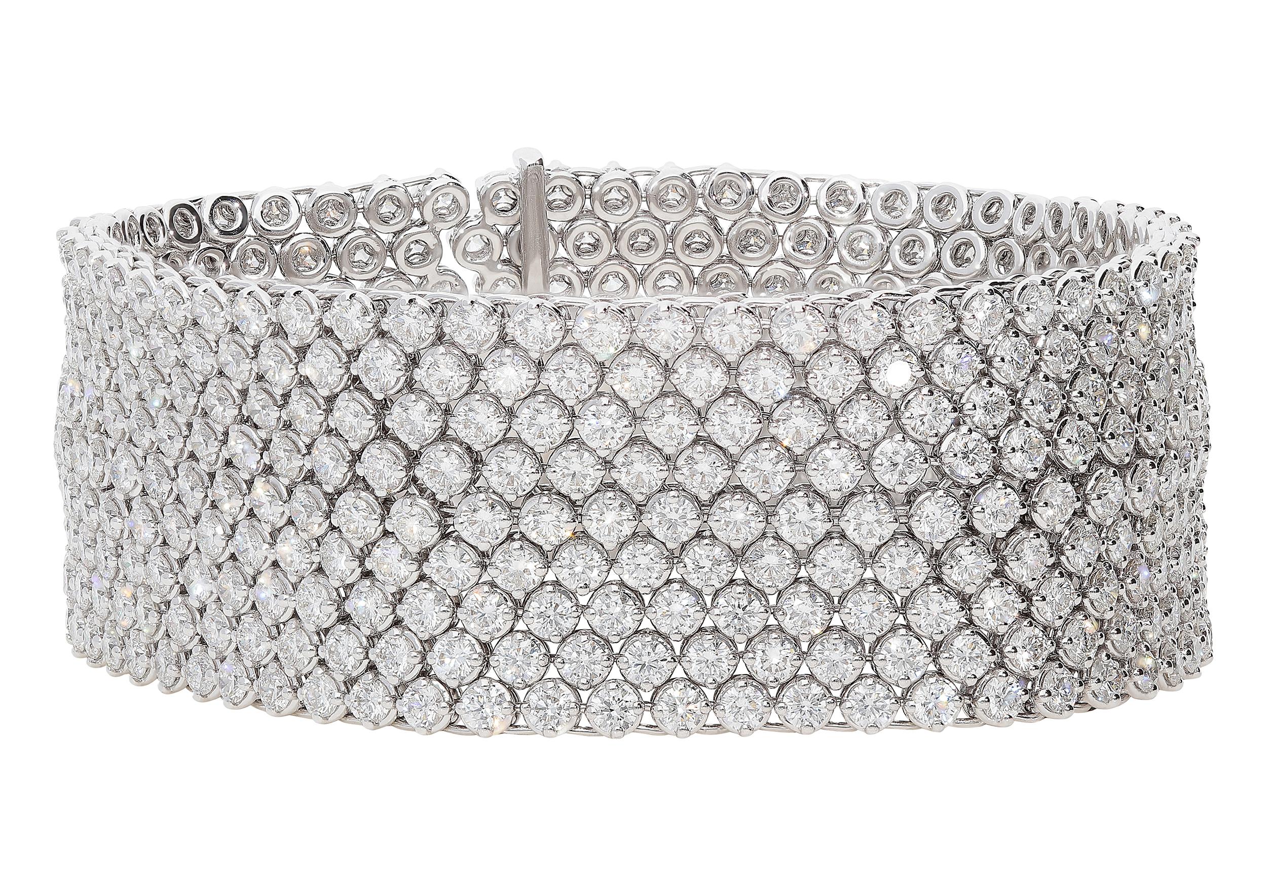 Contemporary 27.10 Carat White GVS Diamonds 18 Karat White Gold 9 Rows Tennis Bracelet For Sale