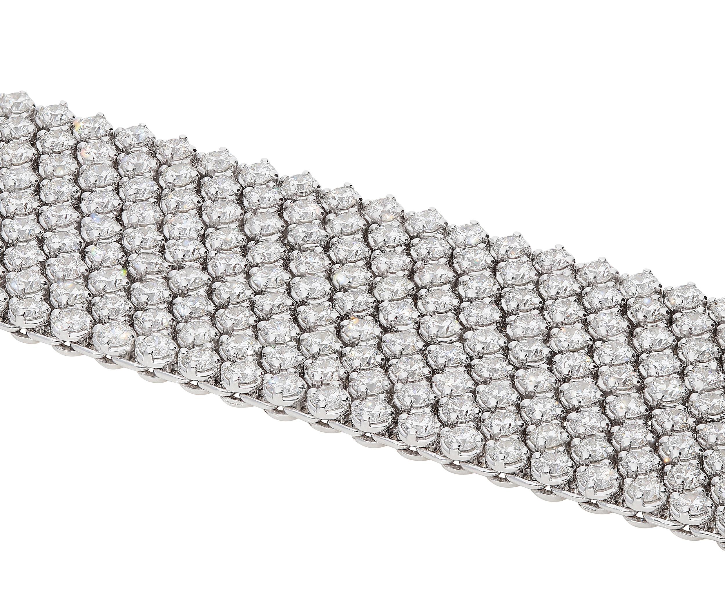 Round Cut 27.10 Carat White GVS Diamonds 18 Karat White Gold 9 Rows Tennis Bracelet For Sale