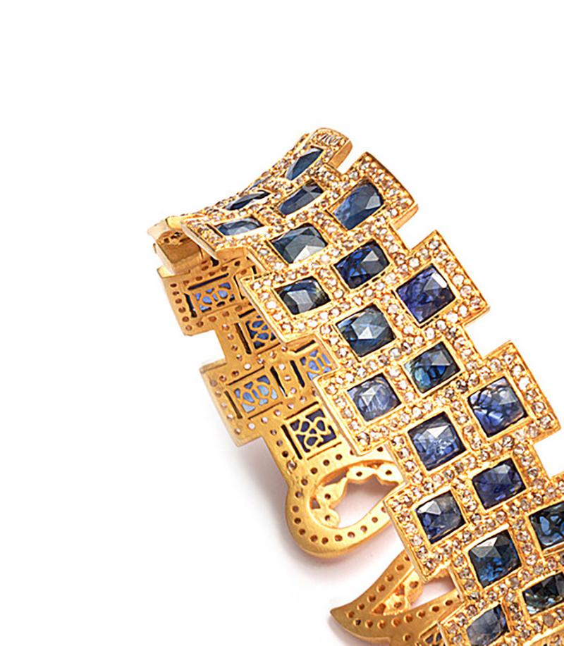 Stunning one of a kind piece from Coomi set in rich 20 Karat Yellow Gold with rare Blue Sapphire weighing approximately 27.17cts and diamonds at 6.33cts, brought to you from the Luminosity collection, which consists of bold design and reflects the