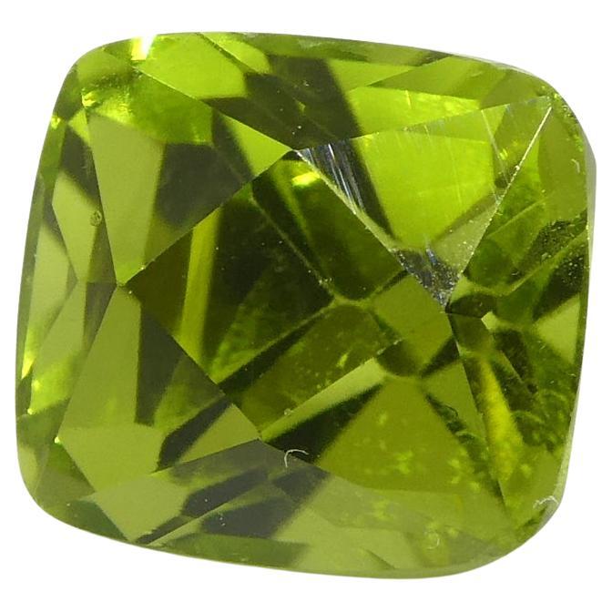 Description:

Gem Type: Peridot
Number of Stones: 1
Weight: 2.71 cts
Measurements: 7.52 x 6.86 x 7.01 mm
Shape: Cushion
Cutting Style Crown: Modified Brilliant Cut
Cutting Style Pavilion: Step Cut
Transparency: Transparent
Clarity: Very Slightly