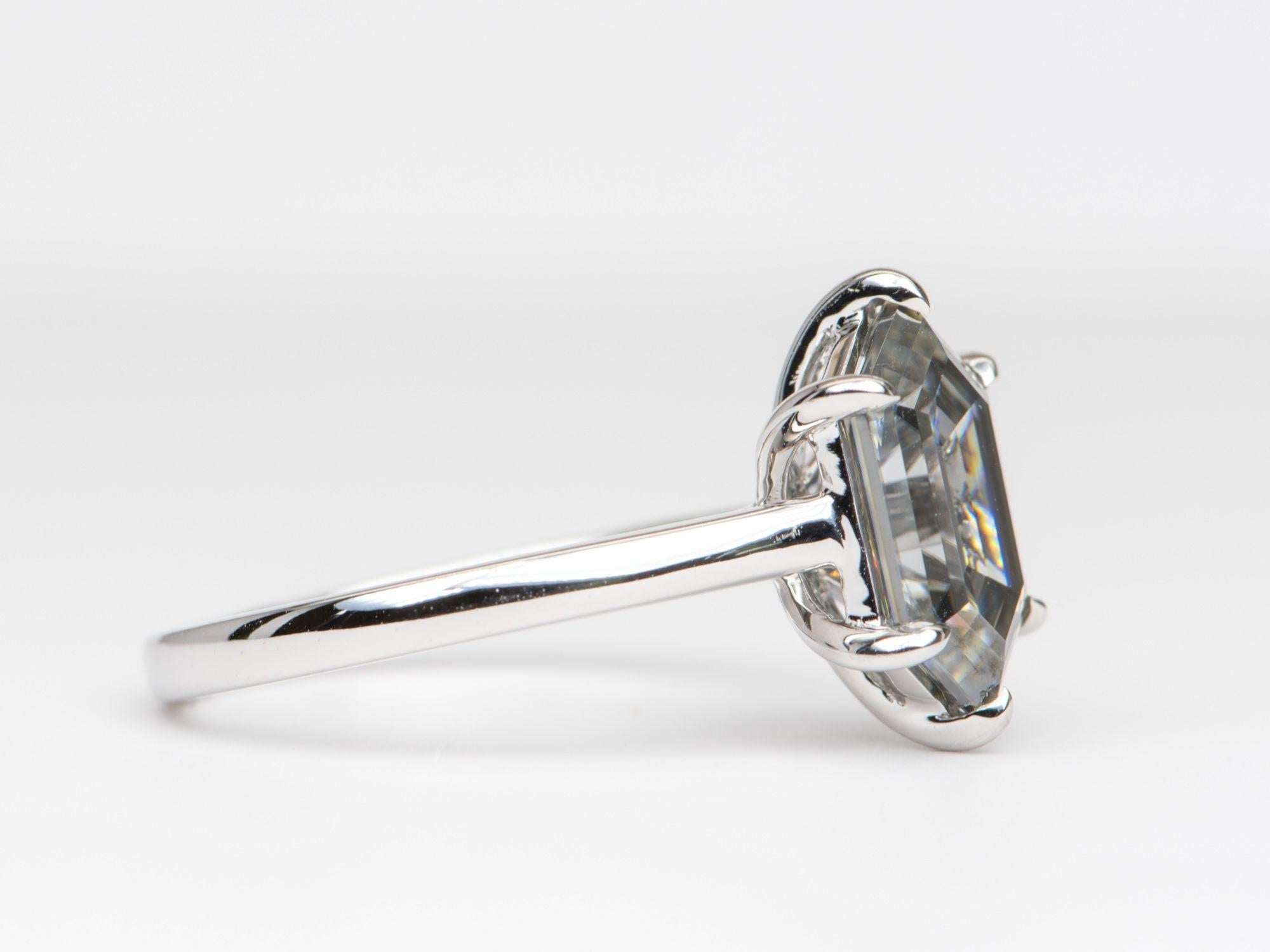 â™¥ This is a stunning ring, featuring a large hexagon moissanite that reflects shades of gray 
â™¥ The setting measures 13.7mm in length, 8.6mm in width, and stands 6.9mm tall from the finger
â™¥ Six claw prongs secure the elongated hexagon