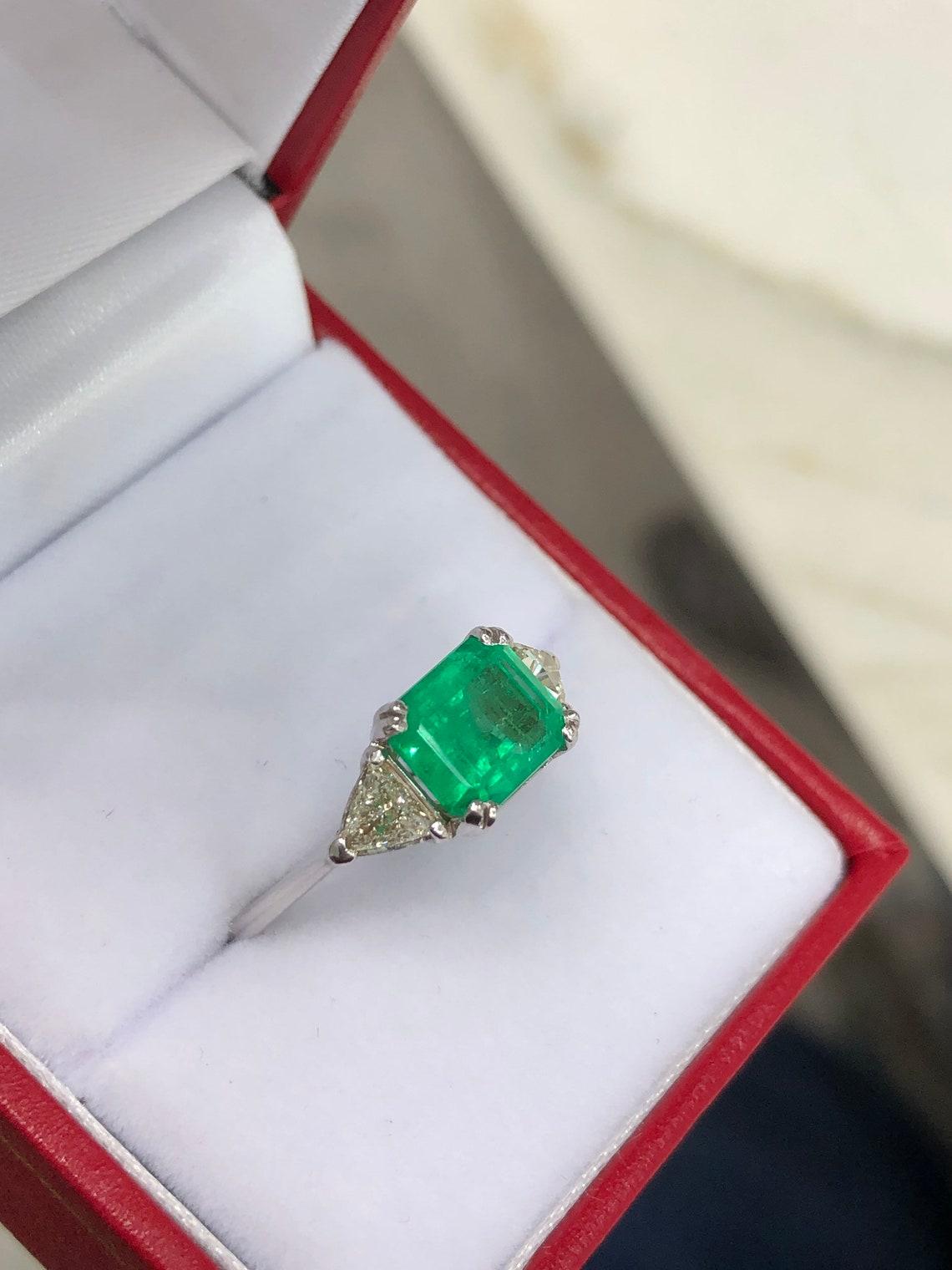 Emerald Cut 2.71tcw 18K Three Stone Colombian Emerald & Diamond Trillion Cut Ring For Sale