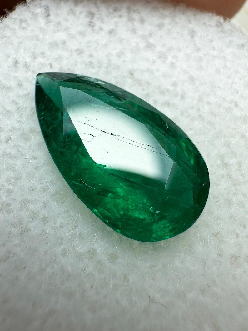 Modern 2.72 Carat 13.8x7.6 Deep Green Zambian Emerald - Pear-Cut May Birthstone Gem For Sale