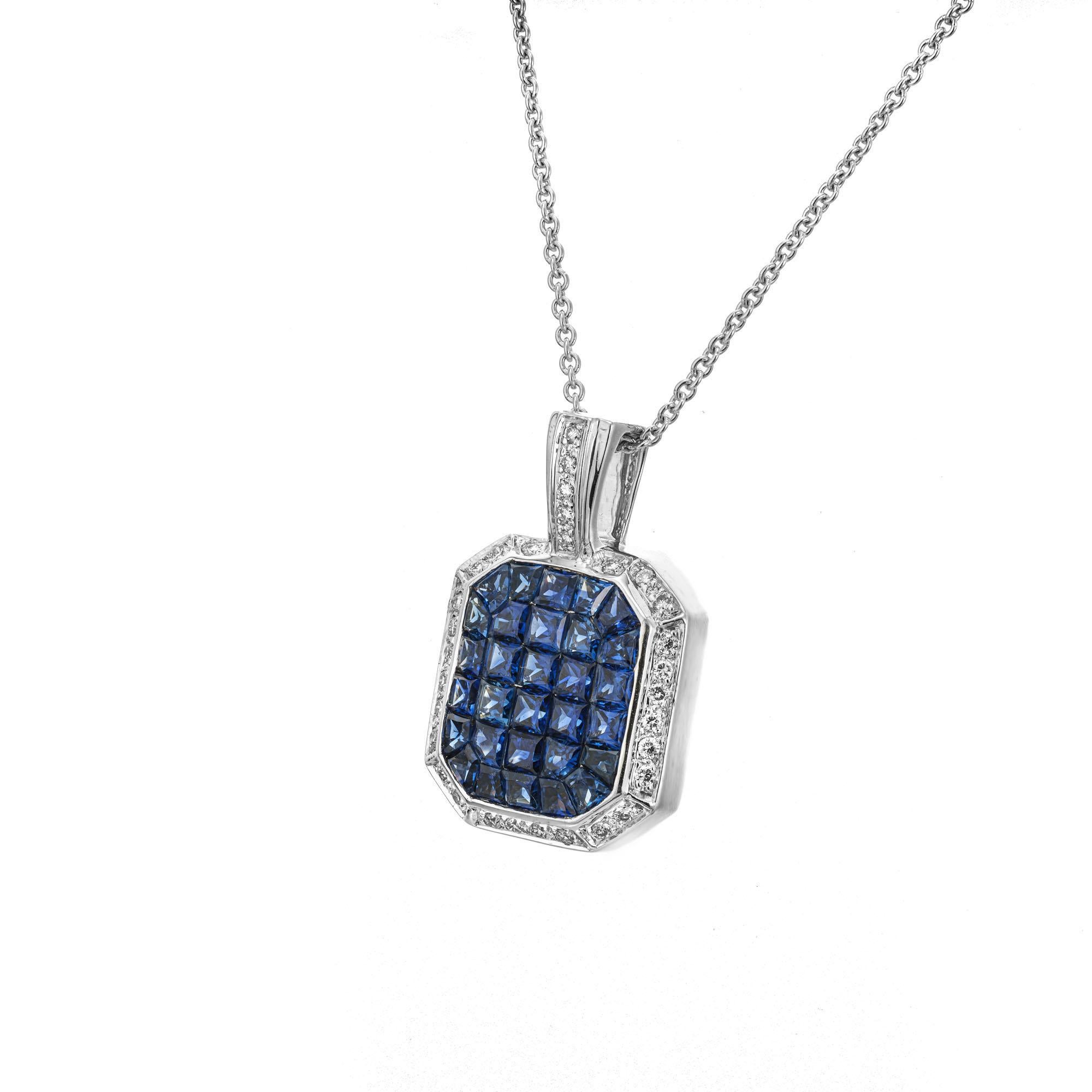 Eight sided Sapphire and diamond pendant necklace. 30 fancy cut invisible set Sapphires in a 18k white gold setting with a diamond halo and bail. 16 inches in length. Dilamani Gem Trading or Dilamani Designs is the maker. 

30 fancy cut sapphires