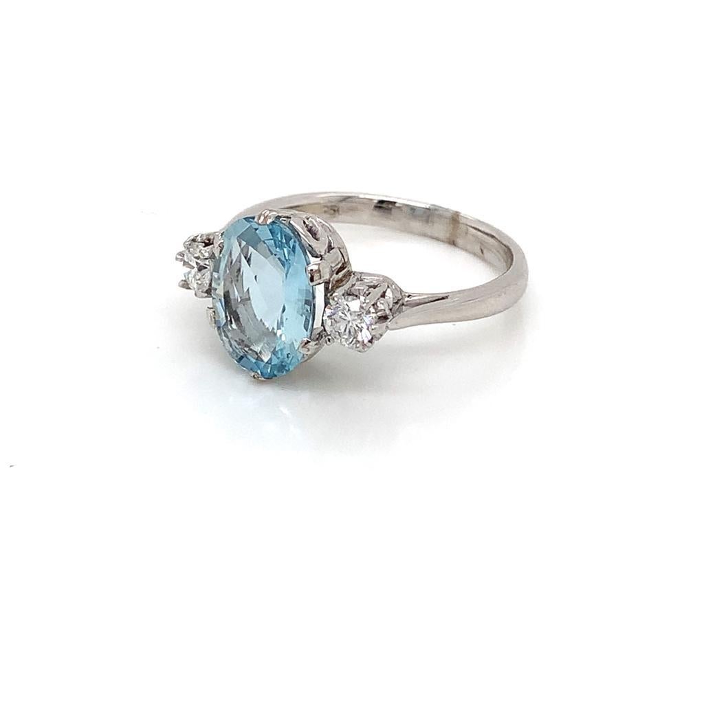 Women's 2.72 Carat Oval Cut Aquamarine and Diamond 3 Stone Ring in 18K White Gold For Sale