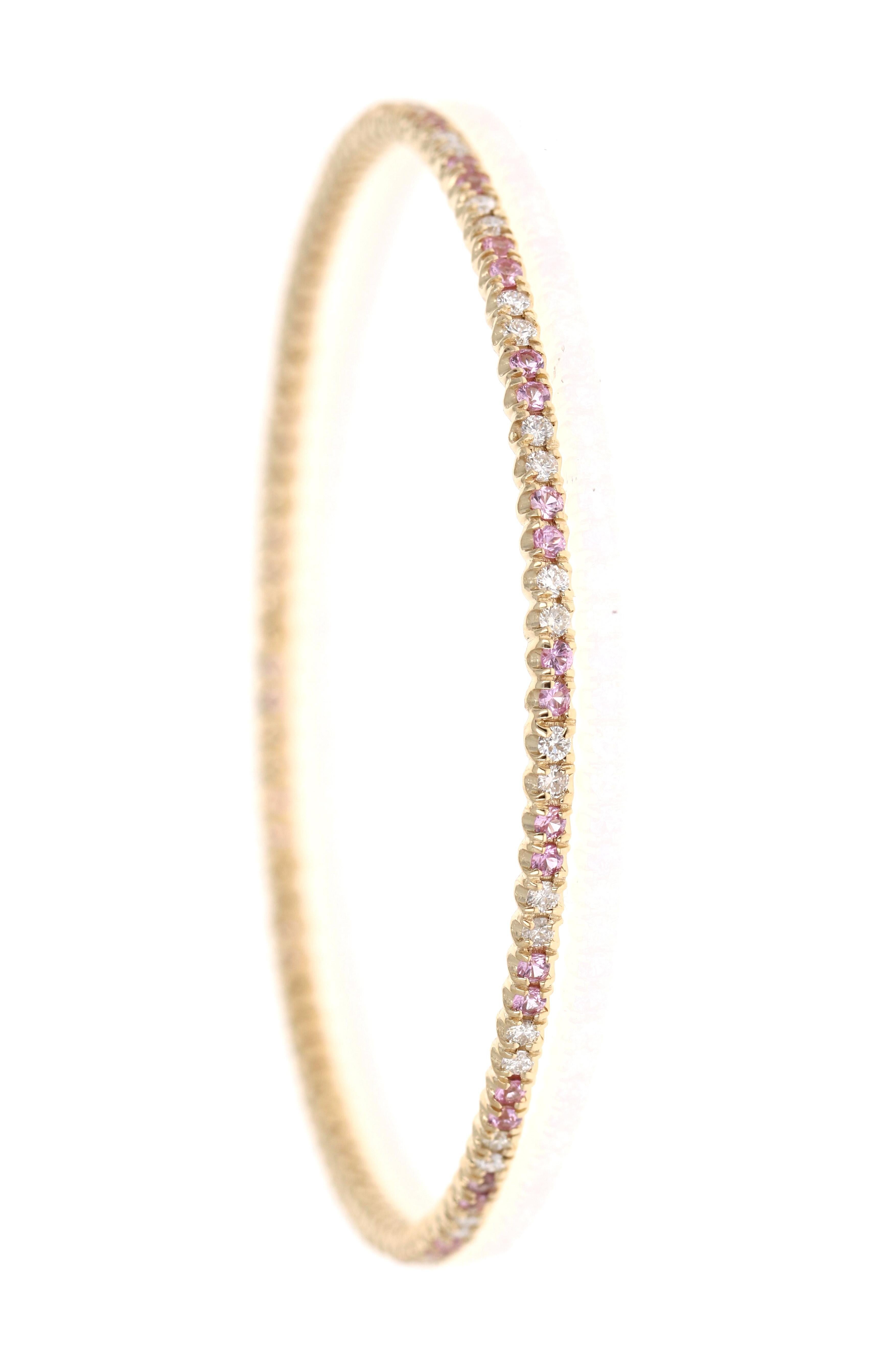 Dainty yet a Bold Beauty! 

This stunning Eternity, Stackable Diamond and Sapphire Bangle has 48 Round Cut Diamonds that weigh 1.20 Carats (Clarity: SI-F) and 48 Round Cut Pink Sapphires that weigh 1.52 Carats. The total carat weight of the Bangle