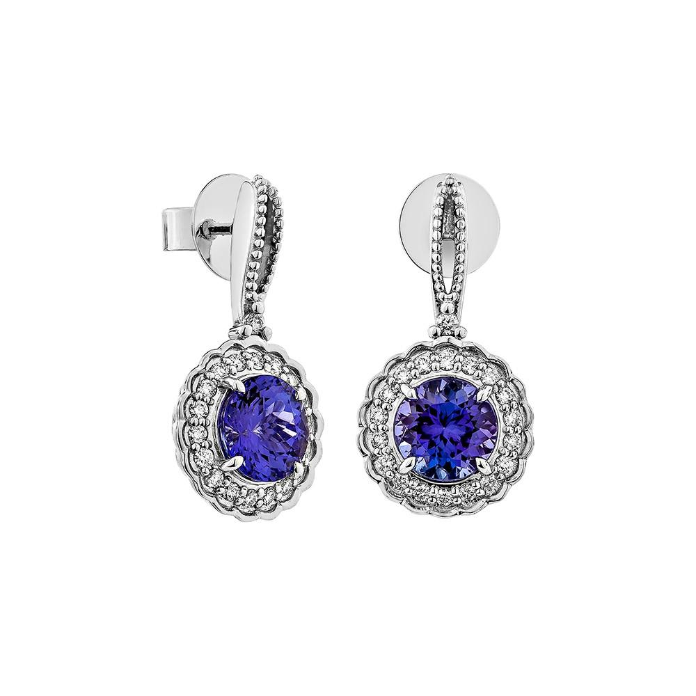 This collection features a selection of the most tantalizing Tanzanite. Uniquely designed with rounds diamonds. The rich purple-blue hues of this gemstone with diamonds set in white gold to present a rich and regal look. 
  
Tanzanite Drop Earrings