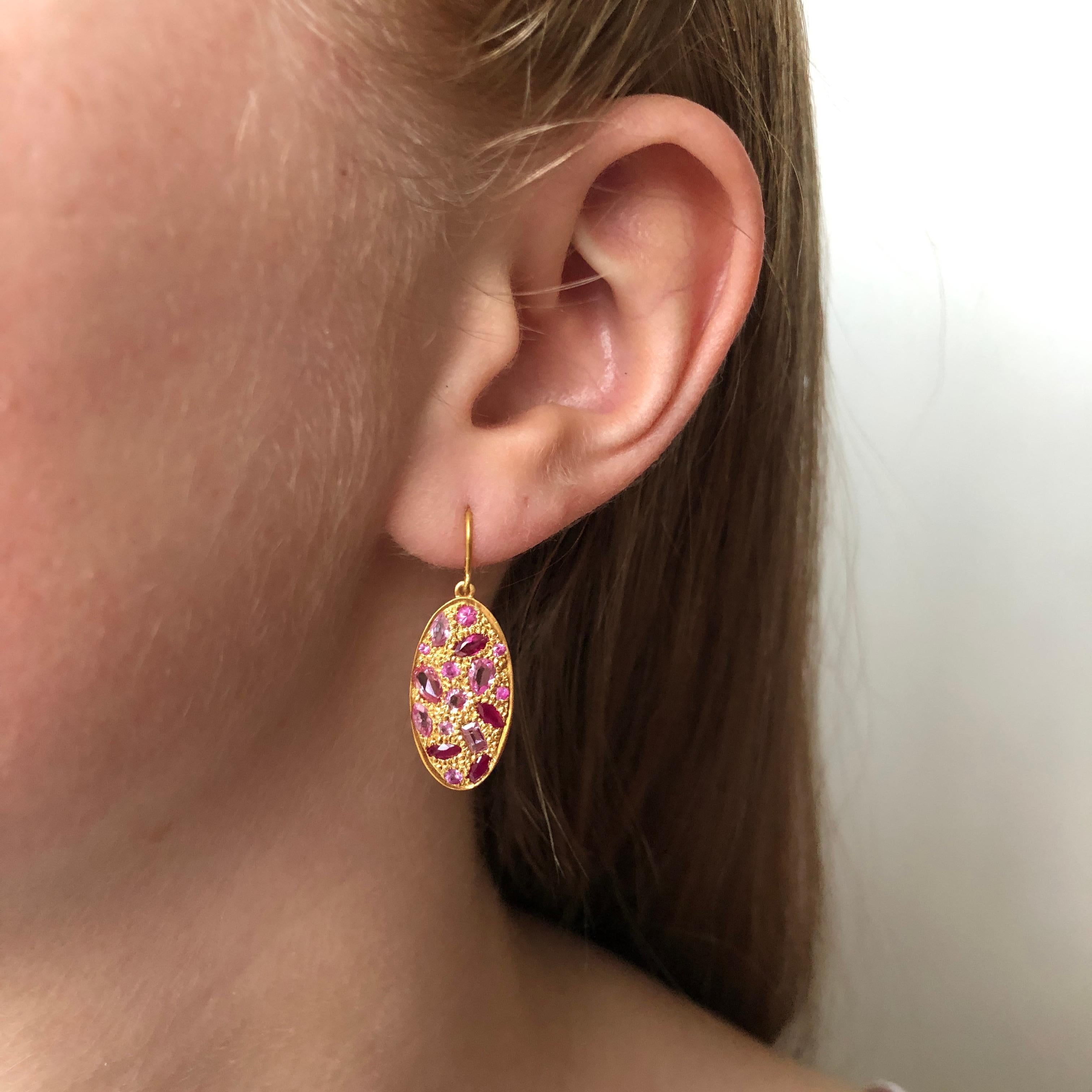 Designed by award winning jewelry designer, Lauren Harper, these Pink Sapphire Earrings are made in a warm 18kt Solid Gold.  Pink Sapphires are several shades of bright pinks, in a detailed grain setting.  Lightweight enough for all day wear,