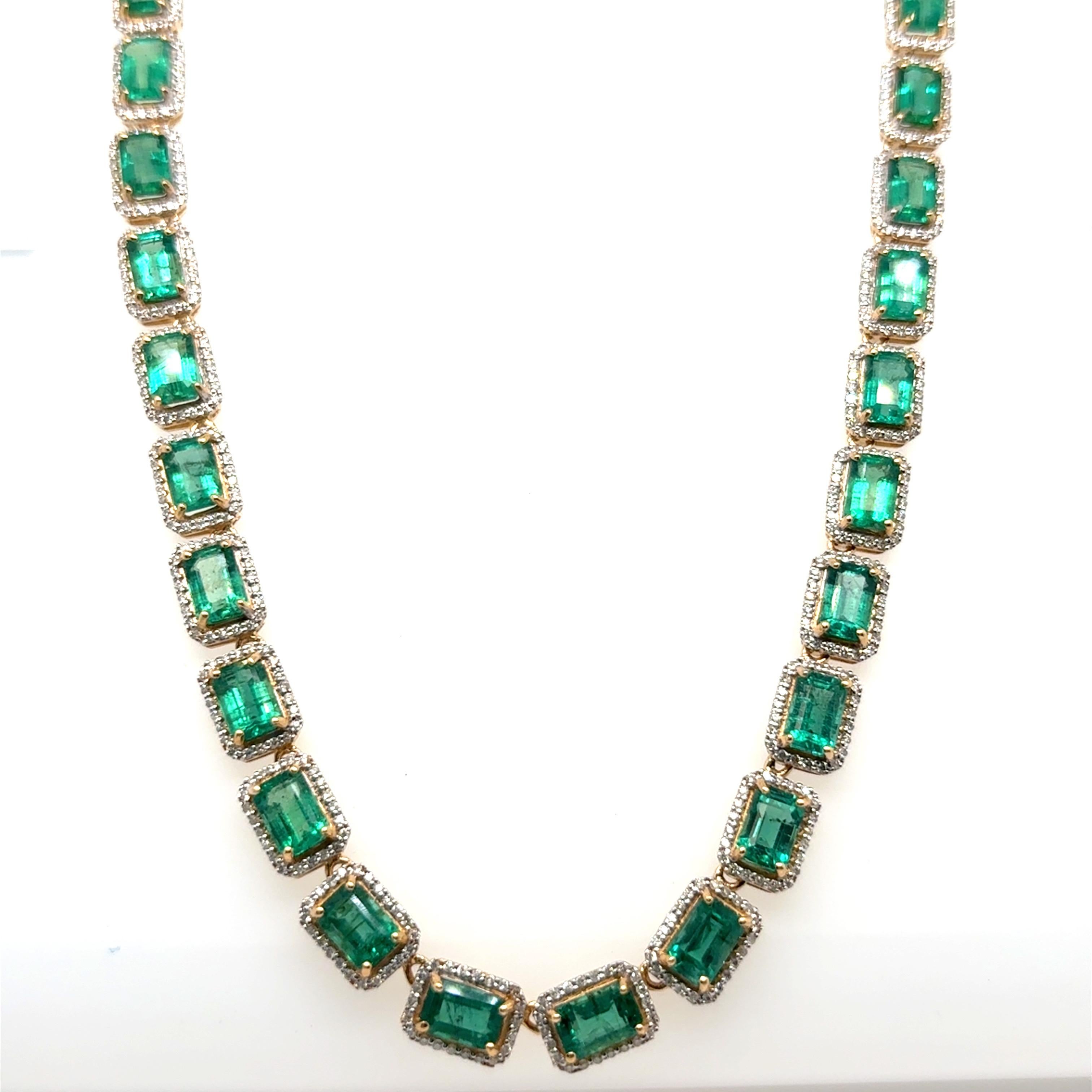 27.20-Carat Octagonal-Cut Emerald and Diamond Necklace
This exquisite necklace features 49 vibrant octagonal-cut emeralds, totaling 27.20 carats. Each emerald is beautifully surrounded by a halo of sparkling diamonds, with a combined diamond weight