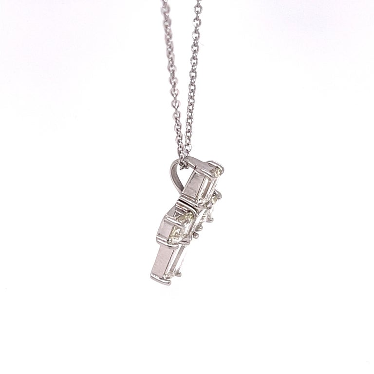 Modern 2.72CTW Emerald Cut Diamond Cross Necklace For Sale