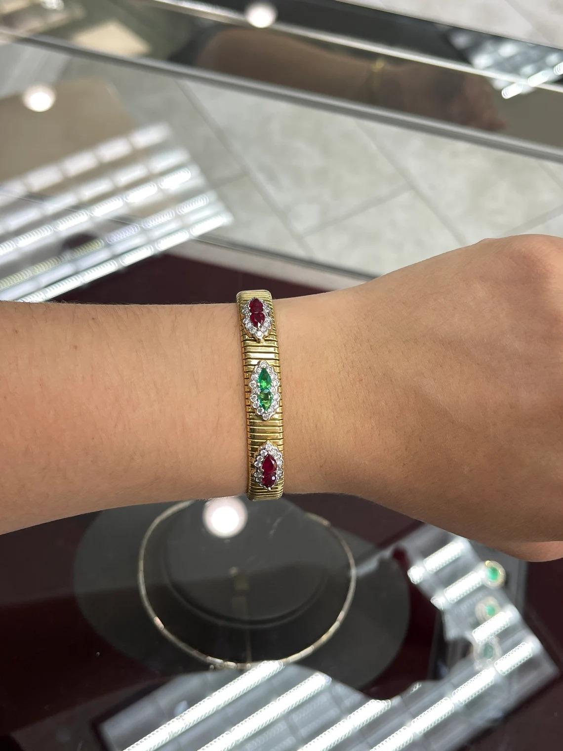Bracelet Style: Bangle
Bracelet Length: -inches
Bracelet Width: 10.20mm

Setting Style: Bezel
Setting Material: 14K Yellow Gold
Setting Weight: 32.3 Grams

Main Stone: Emerald
Shape: Pear Cut
Weight: 0.60-Carats (Total)
Clarity: Transparent
Color: