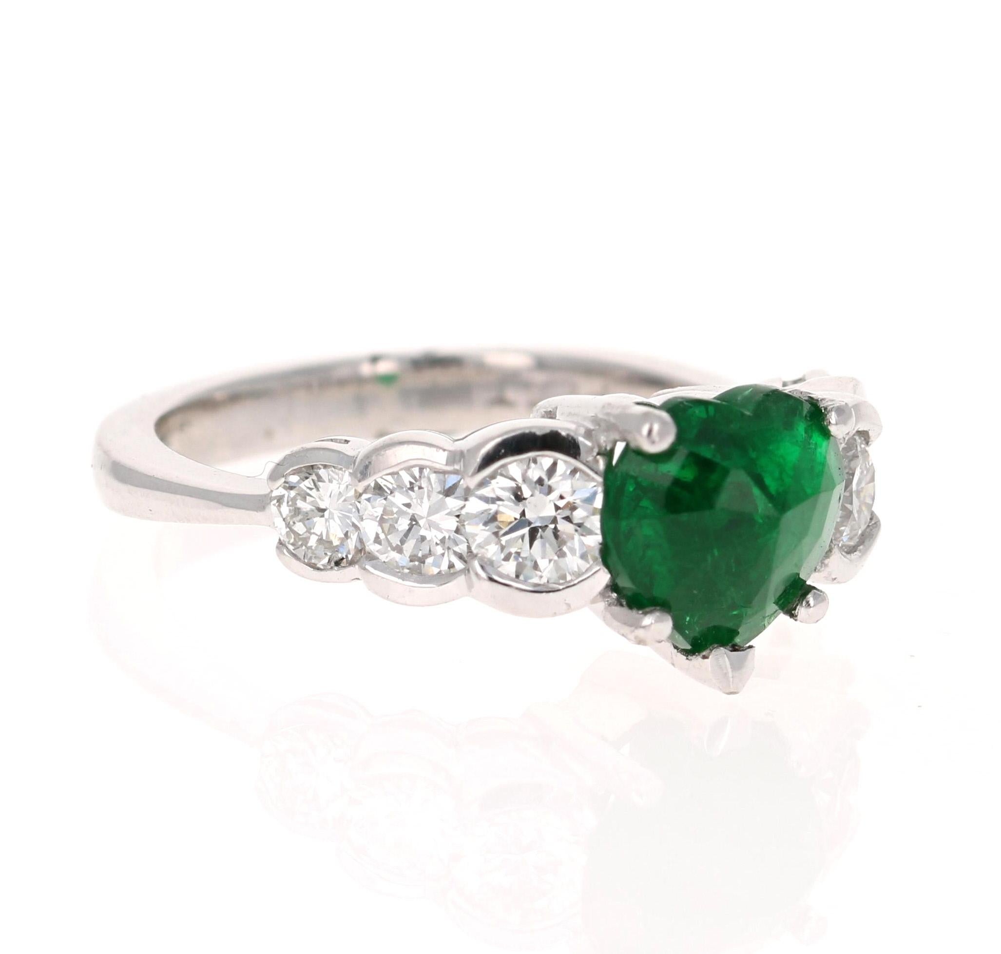 2.73 Carat Heart Cut Emerald Diamond Platinum Engagement Ring

Unique Hear Cut Emerald = 1.63 Carats.
6 Round Cut Diamonds = 1.10 Carats (Clarity: VS2, Color: F).
Platinum = 9.0 Grams.
Ring Size = 7 (Free ring sizing available upon request)